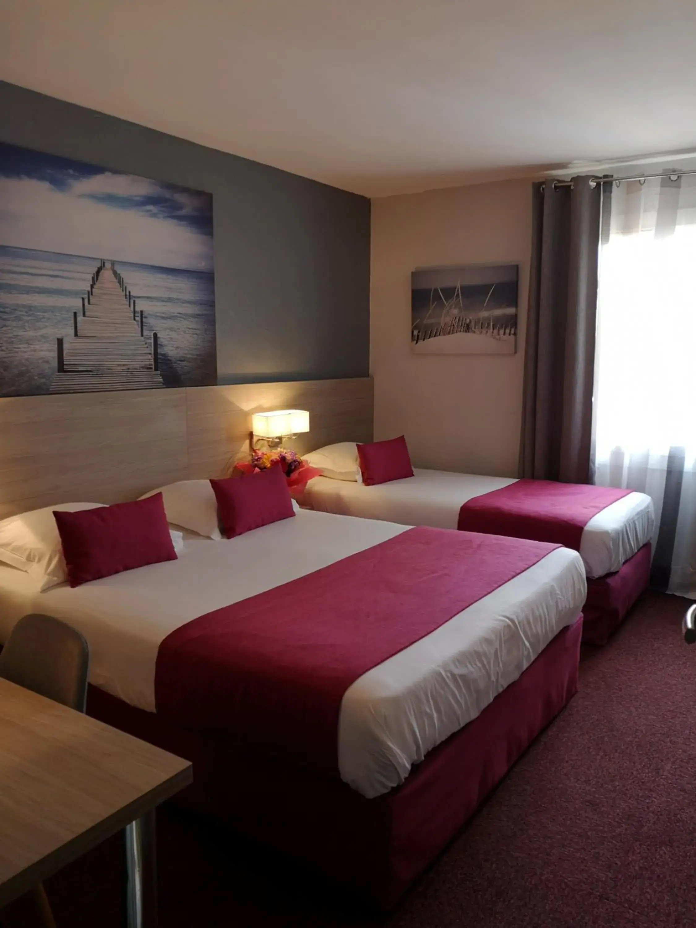 Triple Room (1 Double Bed + 1 Single Bed) in Atoll Hotel restaurant Triple Room (1 Double Bed + 1 Single Bed) in Atoll Hotel restaurant