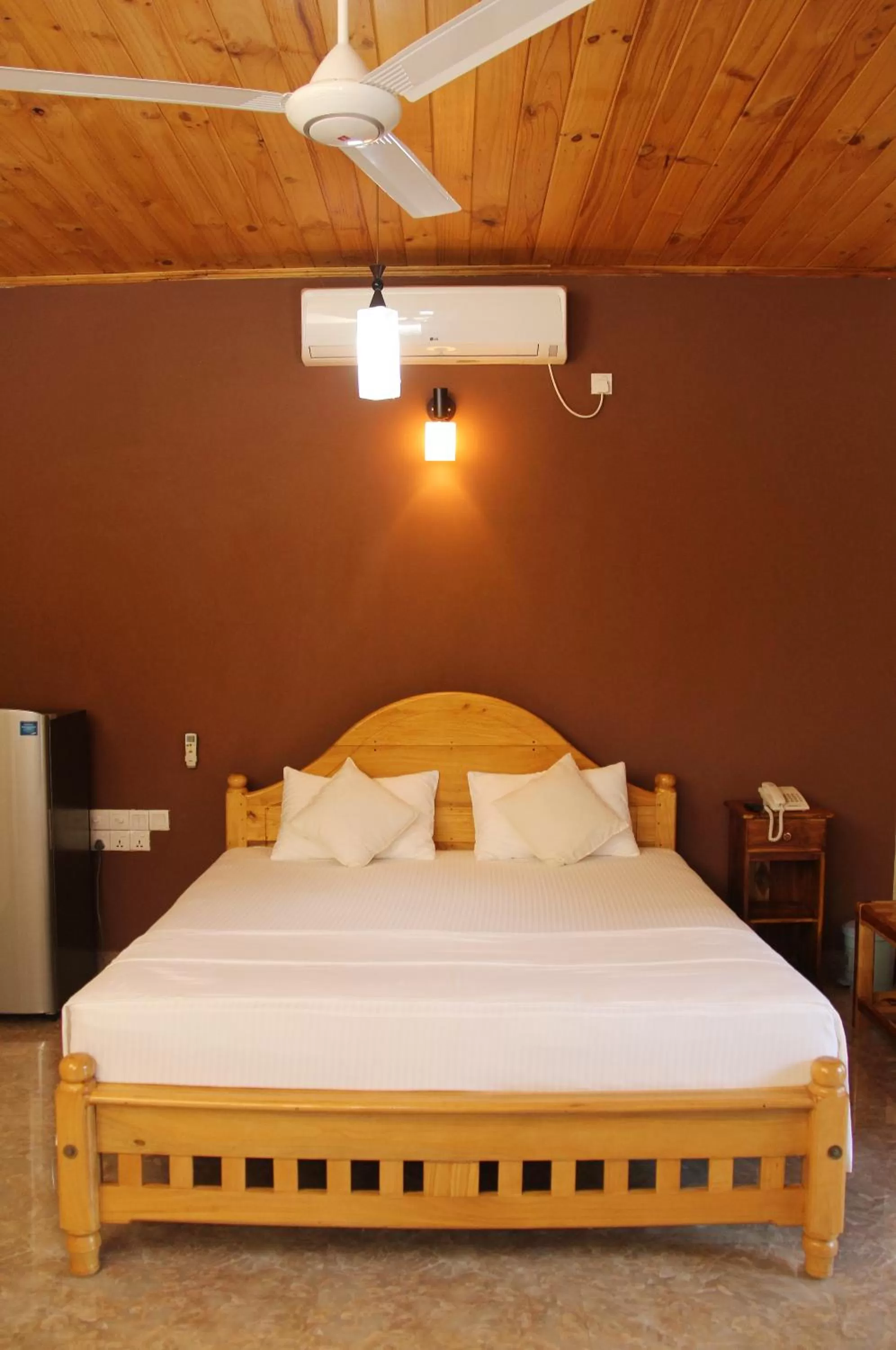 Bed in Bluewater Beach Resort