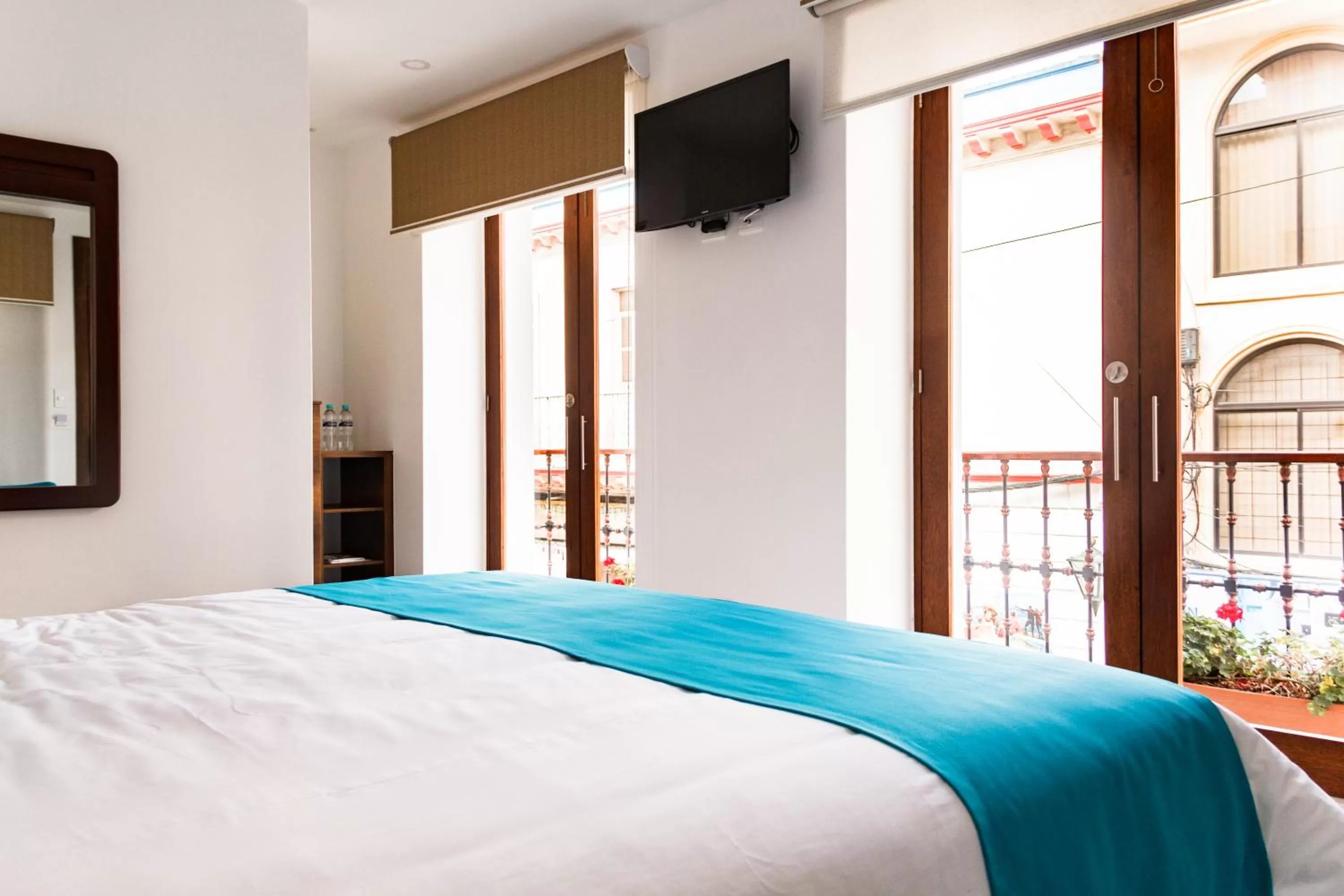 Photo of the whole room, Bed in REEC Latacunga by Oro Verde Hotels