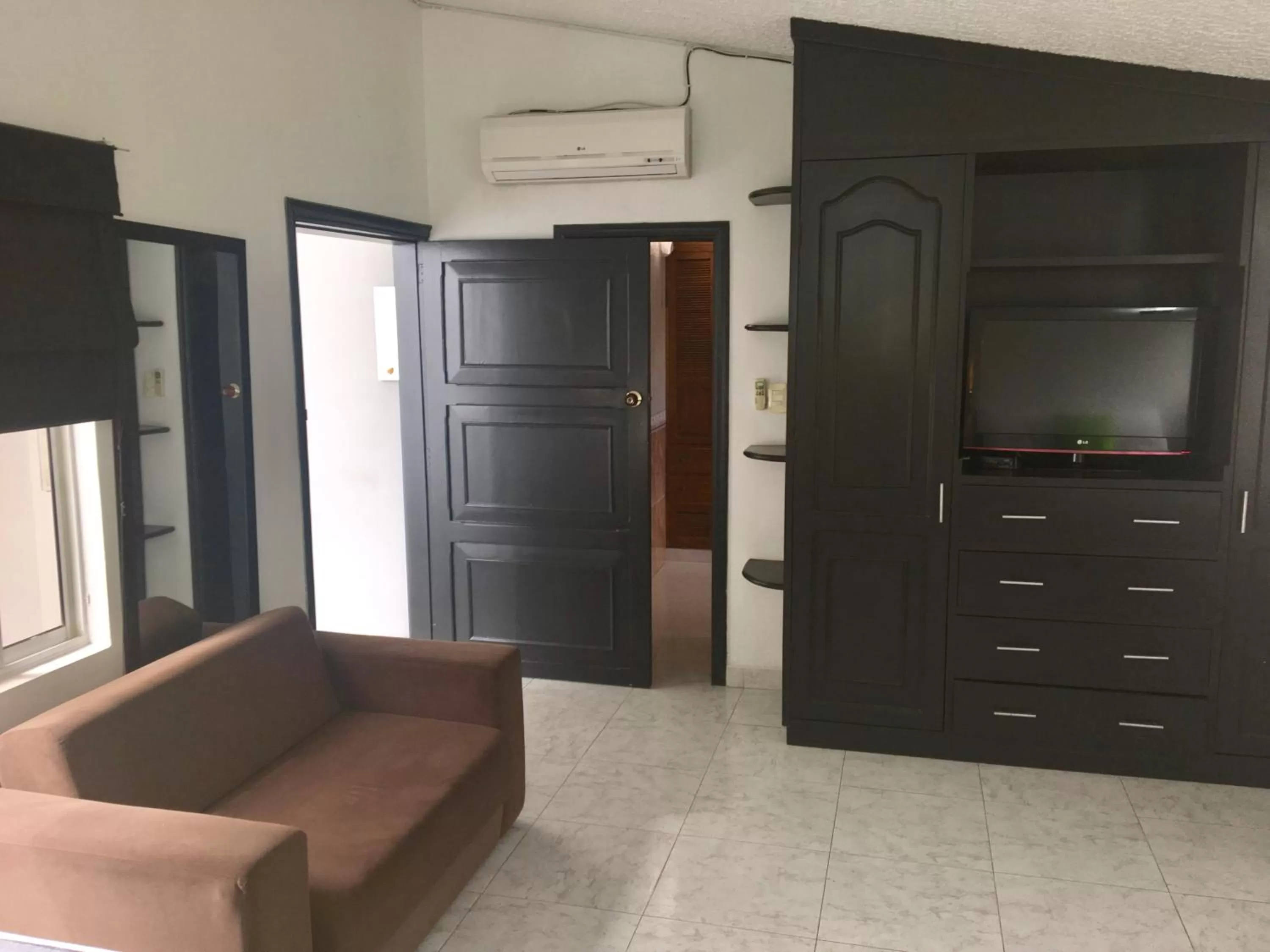 TV and multimedia, TV/Entertainment Center in Hotel Loft Dorado