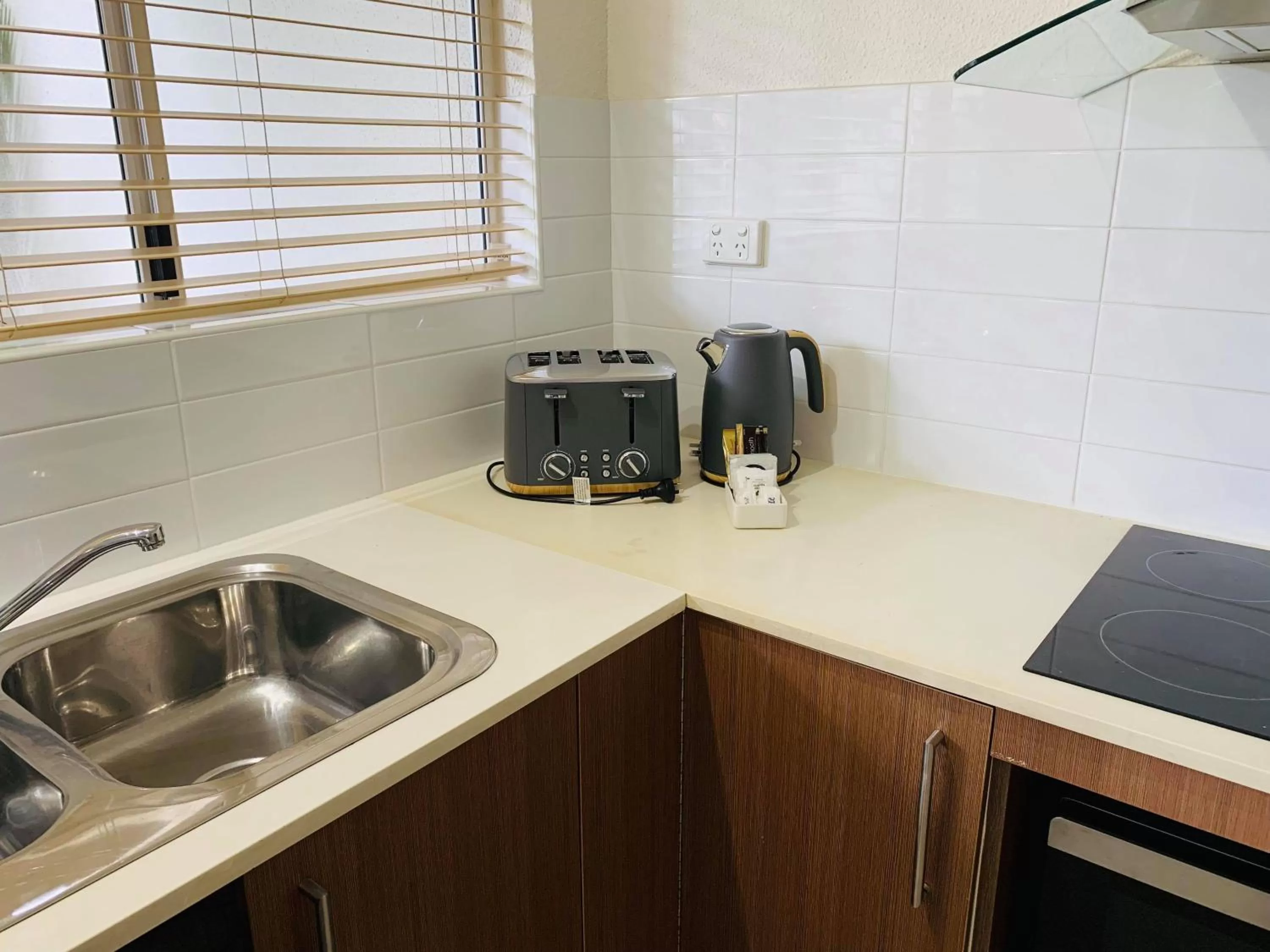 Kitchen or kitchenette in Reef Resort Villas Port Douglas