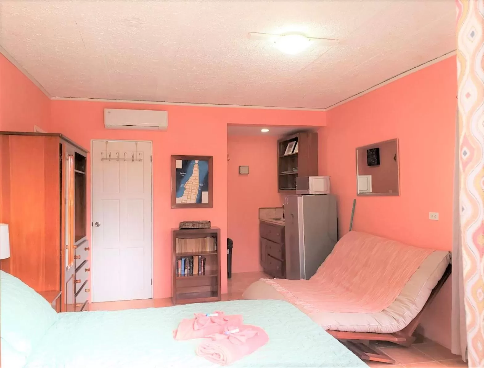 Bed in Beach Side Condos Caye Caulker by CCVH