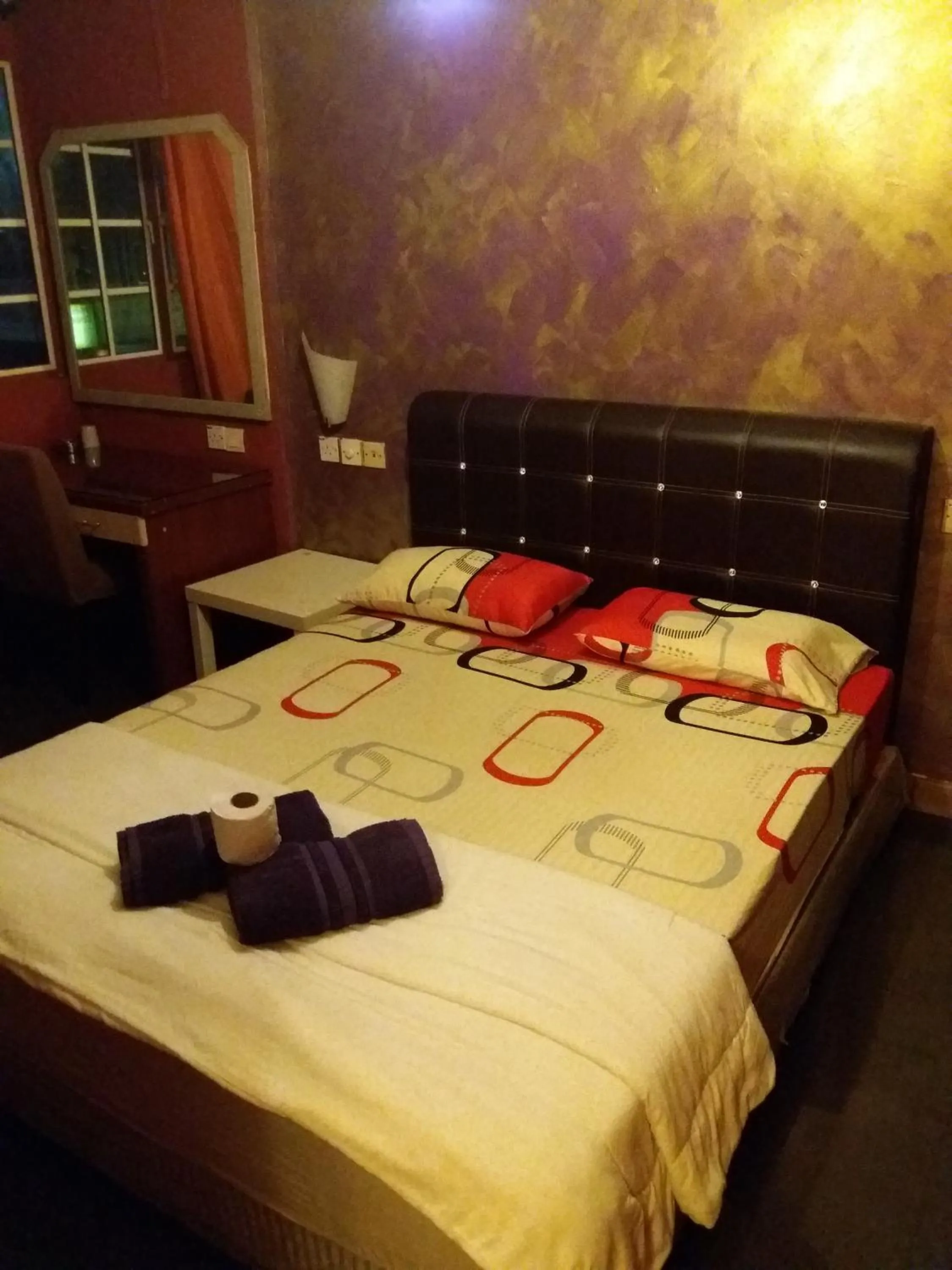 Bed in City Inn Hotel