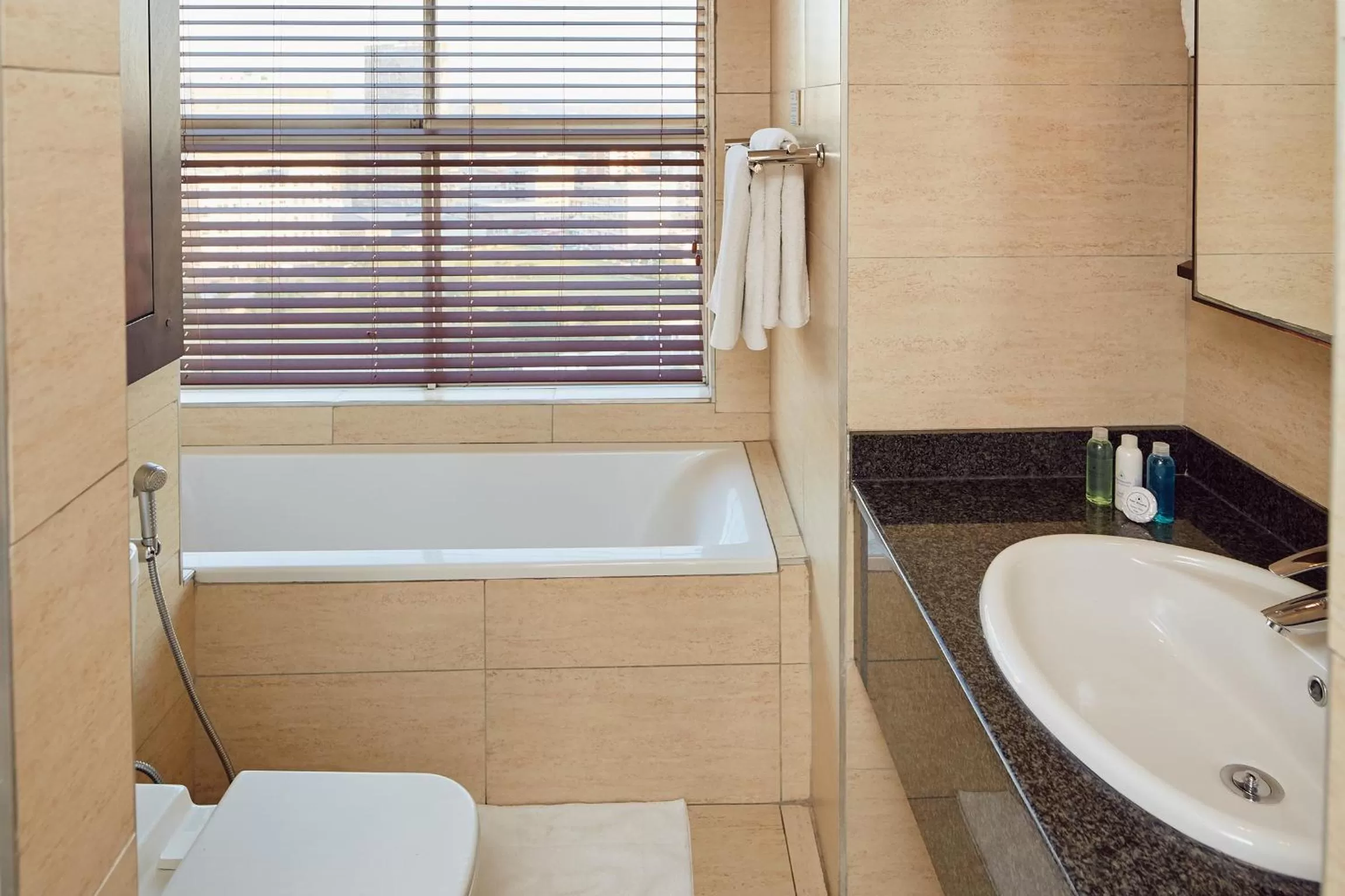 Shower in First Group The Palace All-Suite