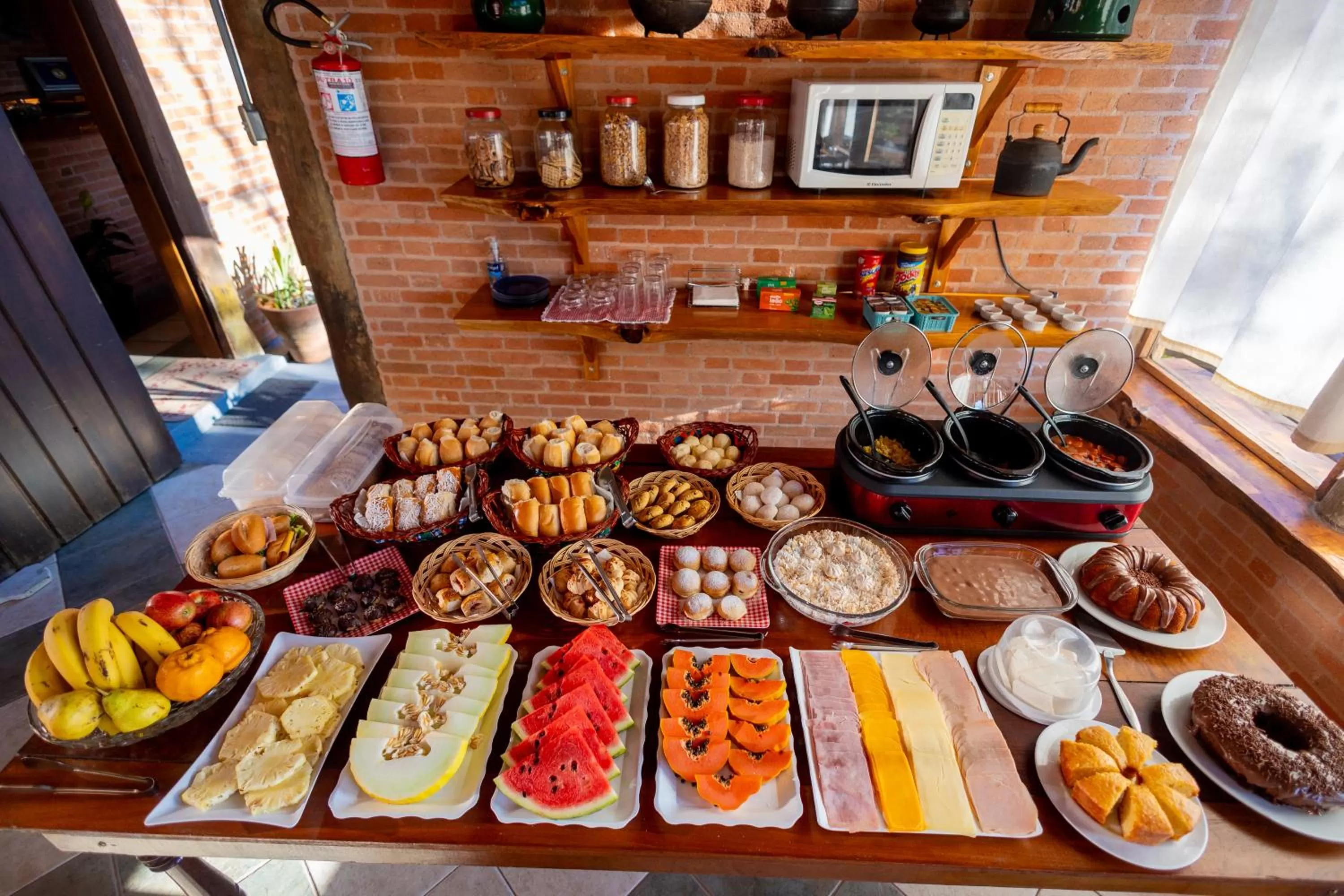 Kitchen/Kitchenette in Chalés 3 Pinheiros