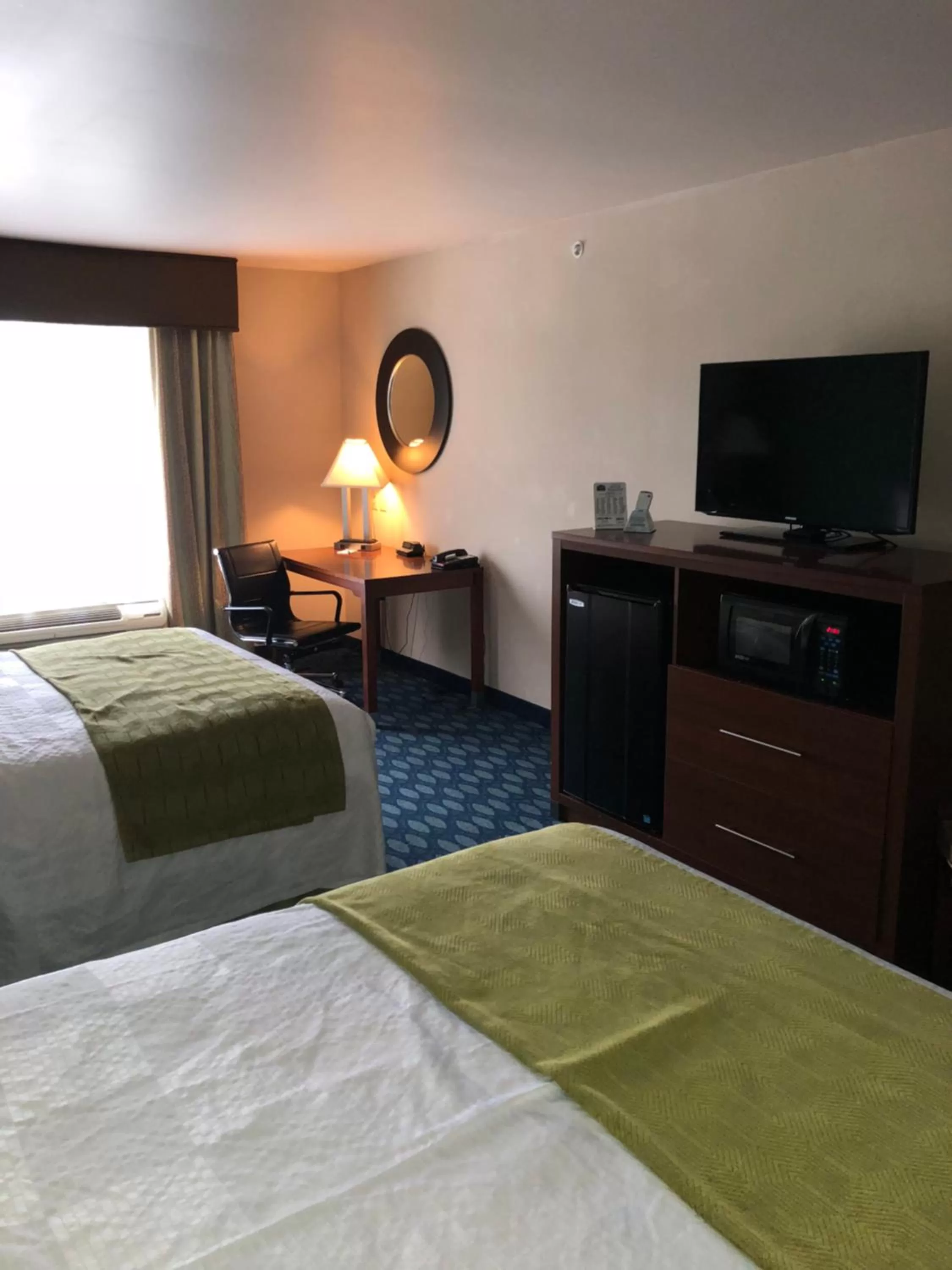 Bed in Countryview Inn & Suites