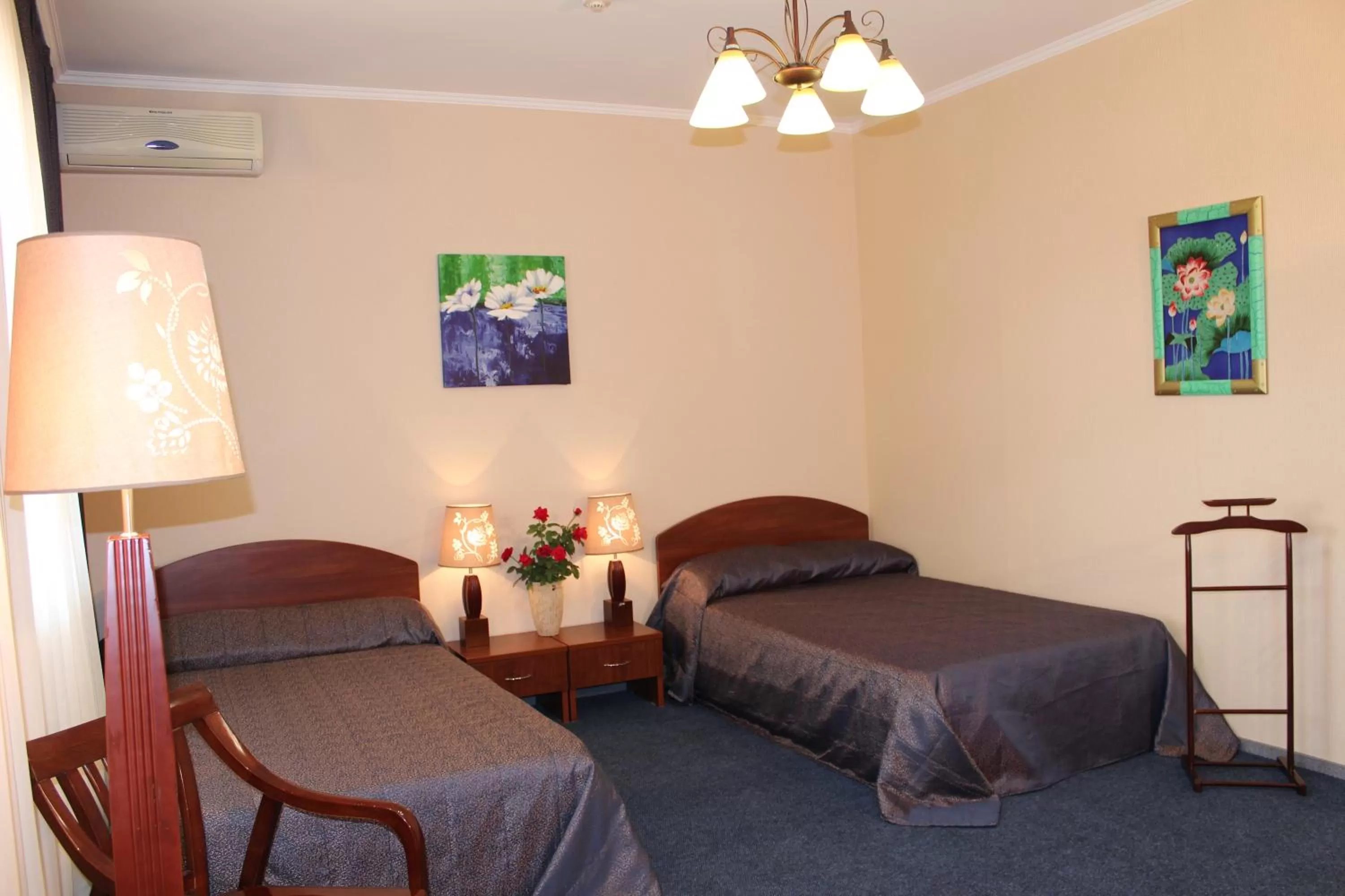 Seating area, Bed in Rahat Hotel