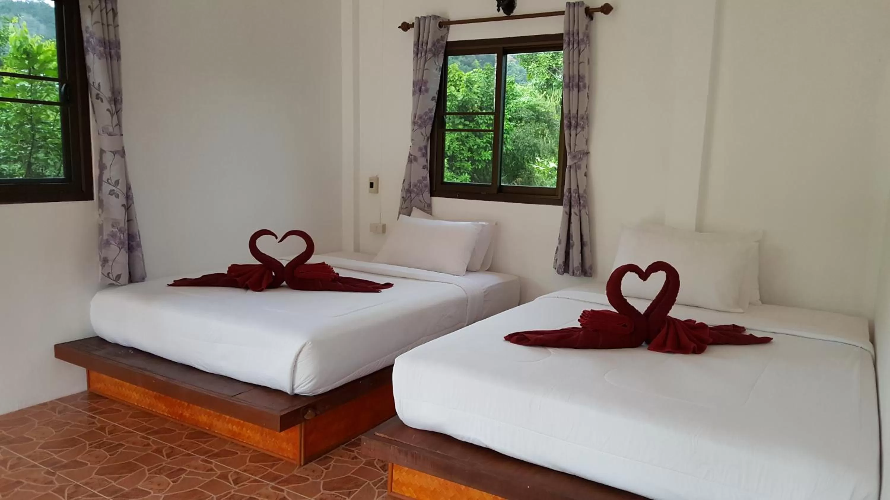 Bed in Khao Sok Jungle Huts Resort