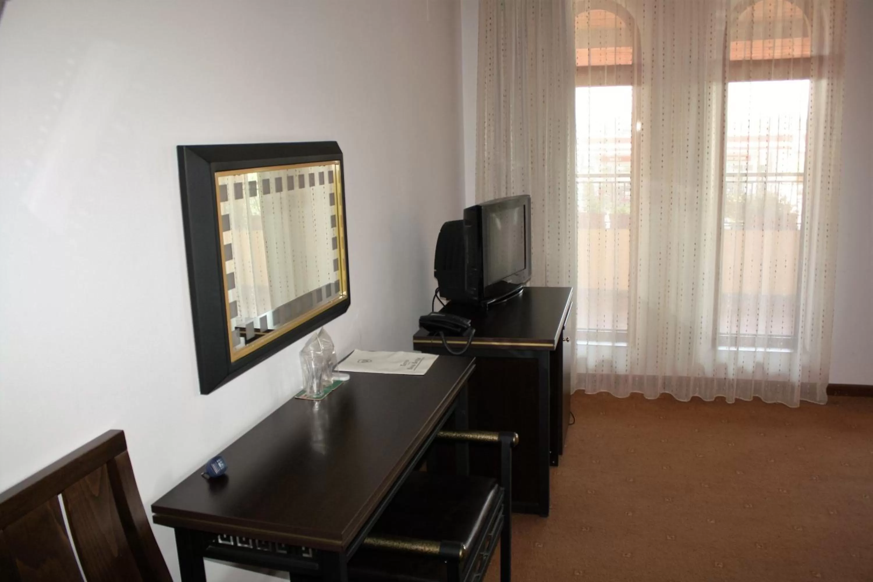 Photo of the whole room, TV/Entertainment Center in Hotel Villa Verde