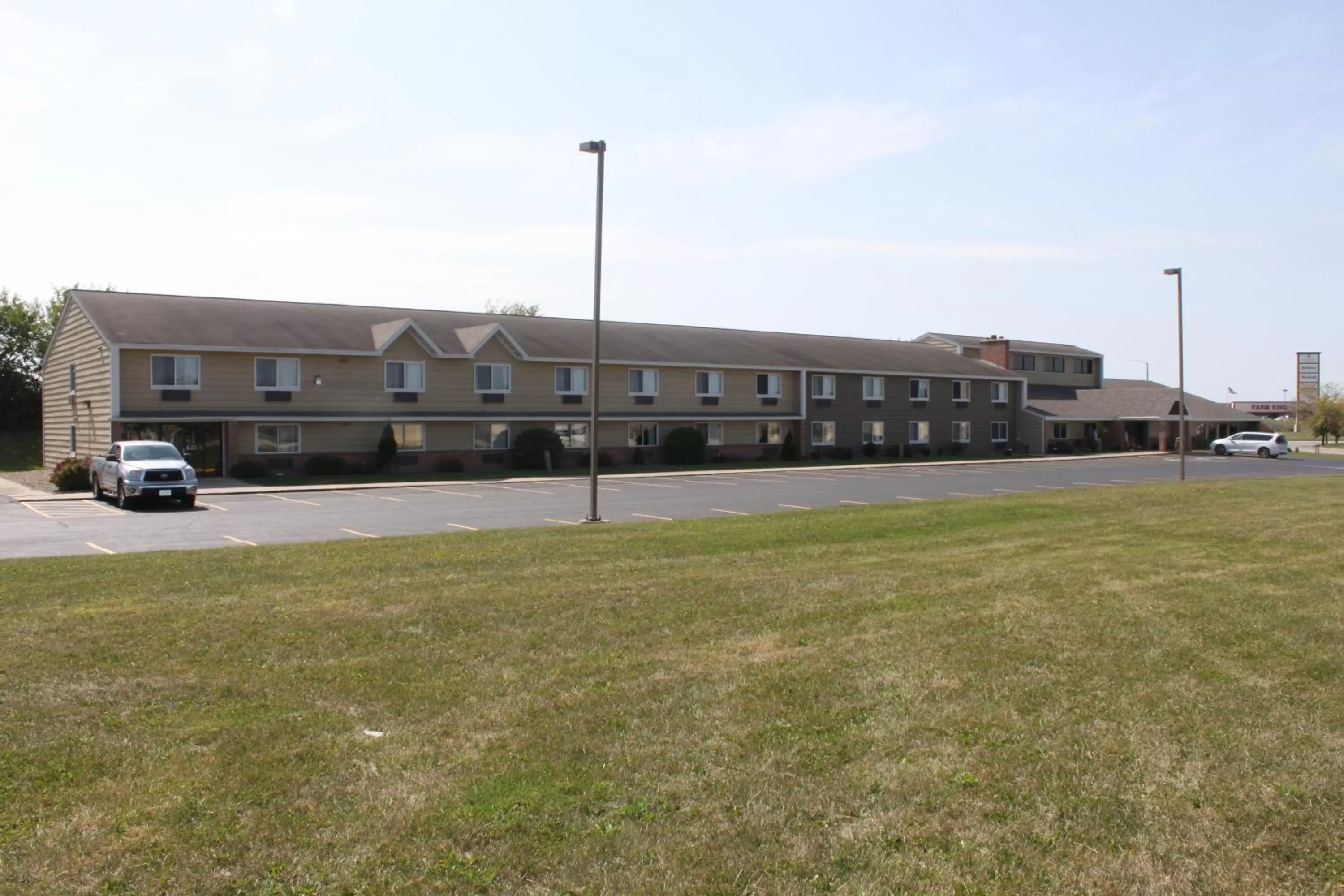 Property building in AmericInn by Wyndham West Burlington