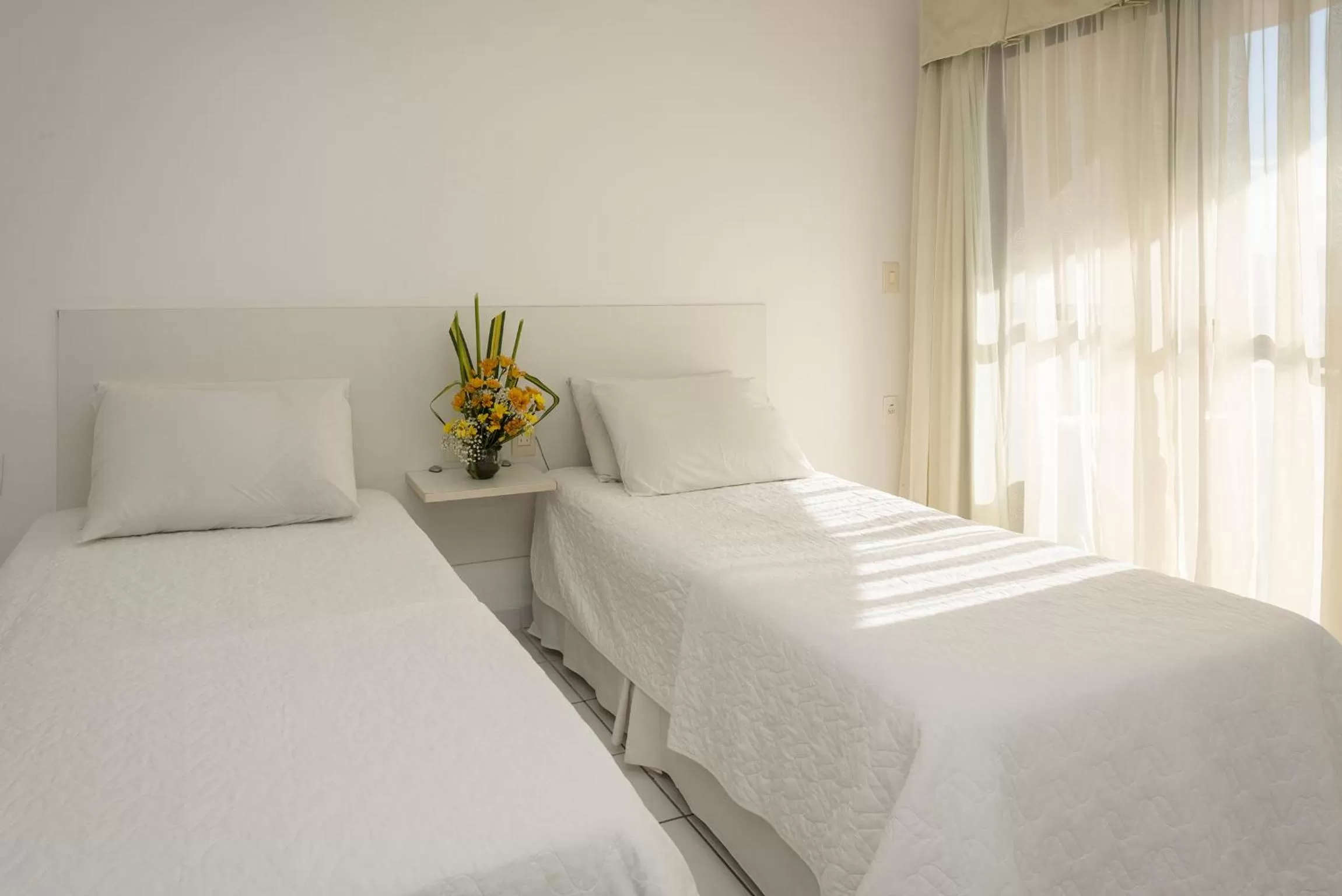 Bed in Arrey Executive Hotel