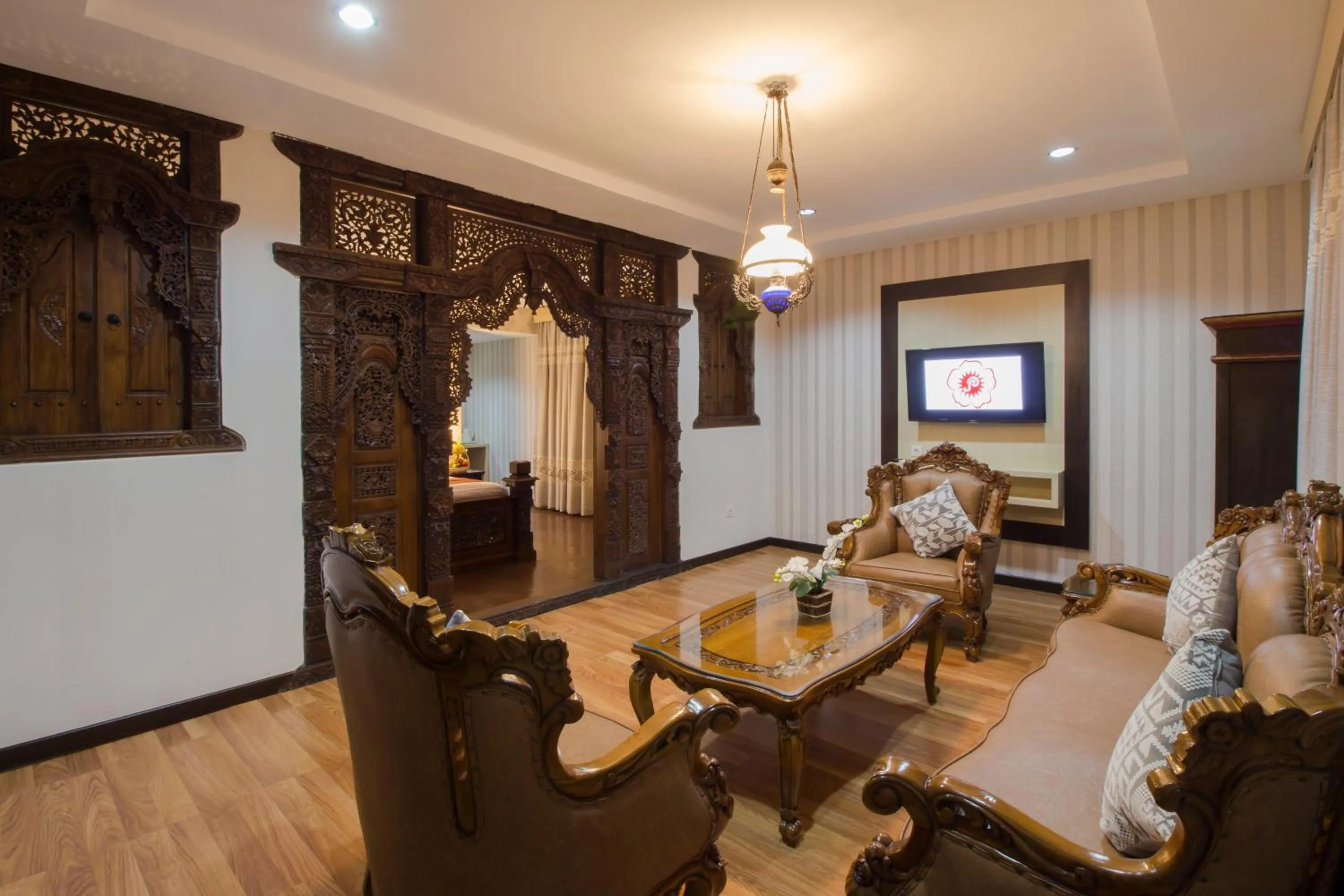 Living room in Grand Puri Saron Hotel Yogyakarta