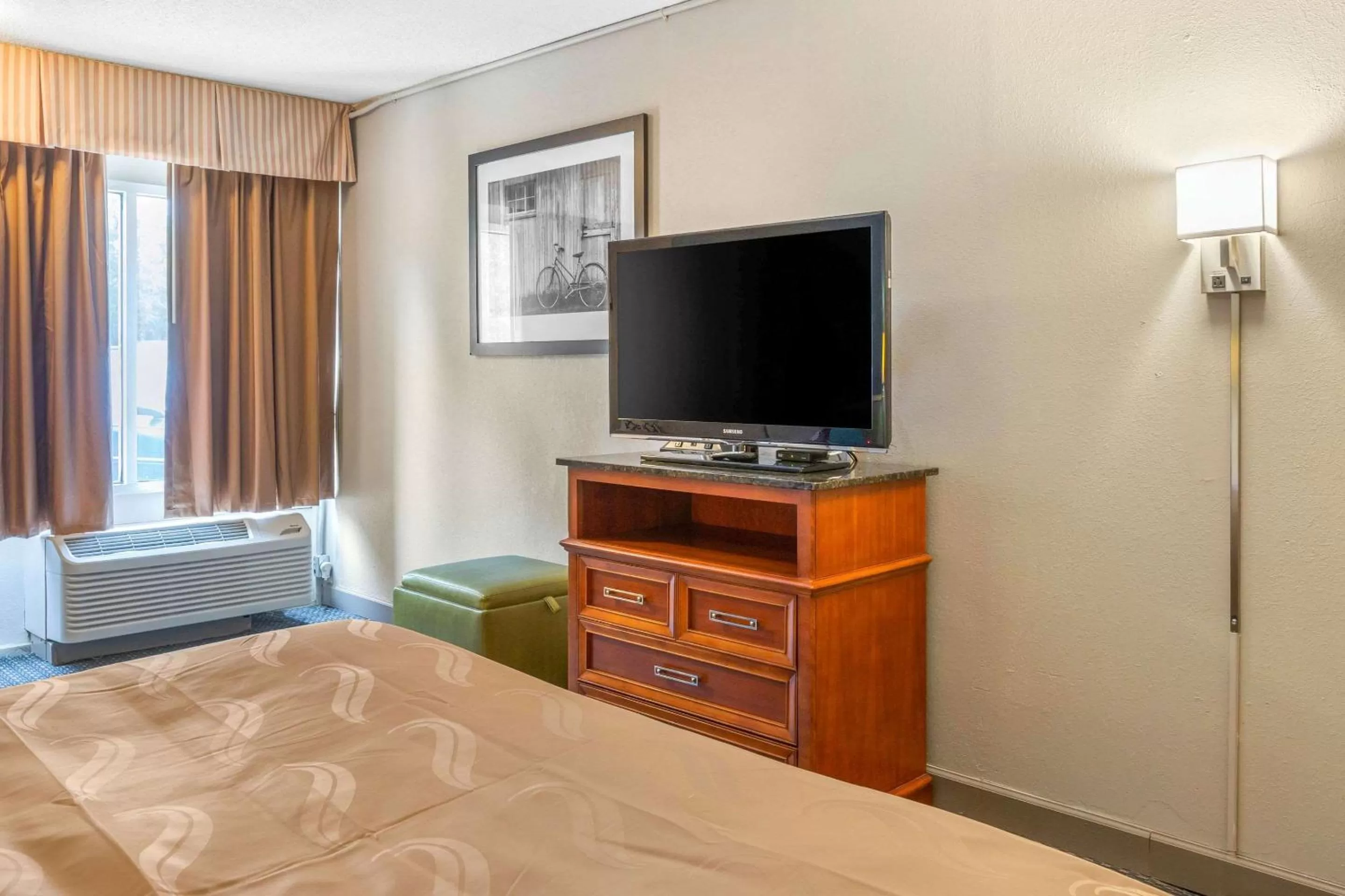 Photo of the whole room, Bed in Quality Inn & Suites Apex - Holly Springs NC