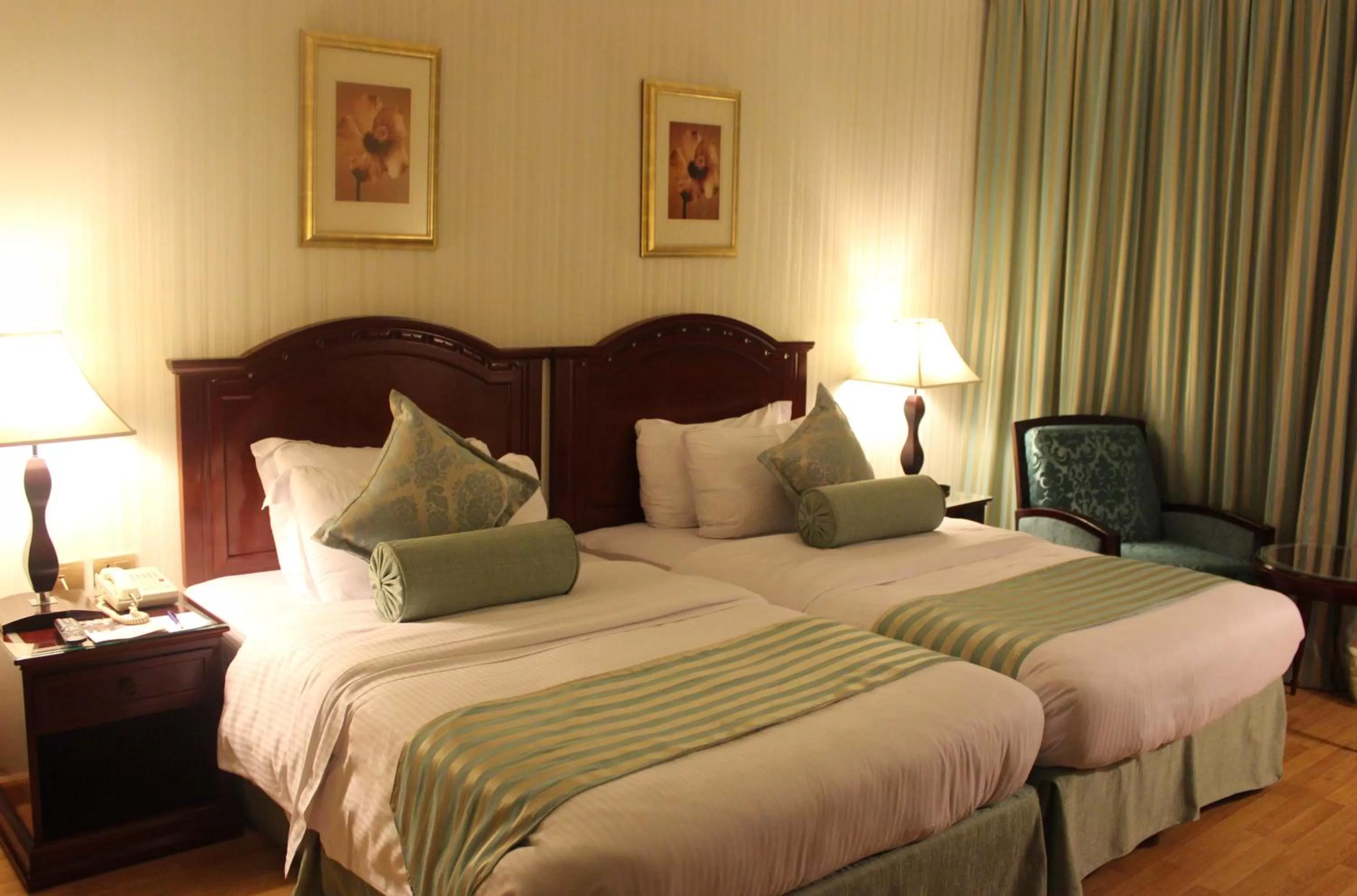 Bed in Swiss Al Hamra Hotel