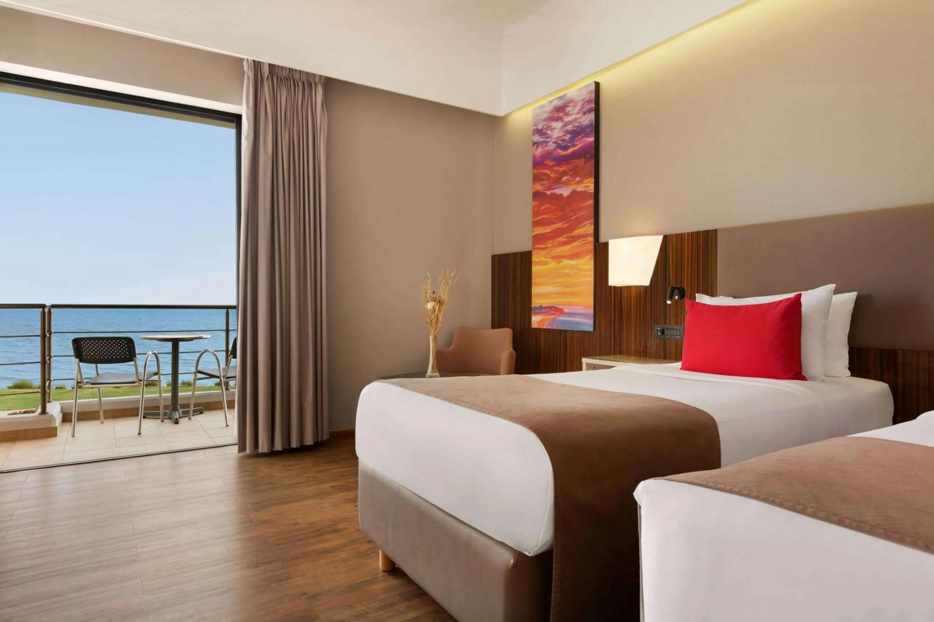 Photo of the whole room, Bed in Ramada Plaza by Wyndham Thraki