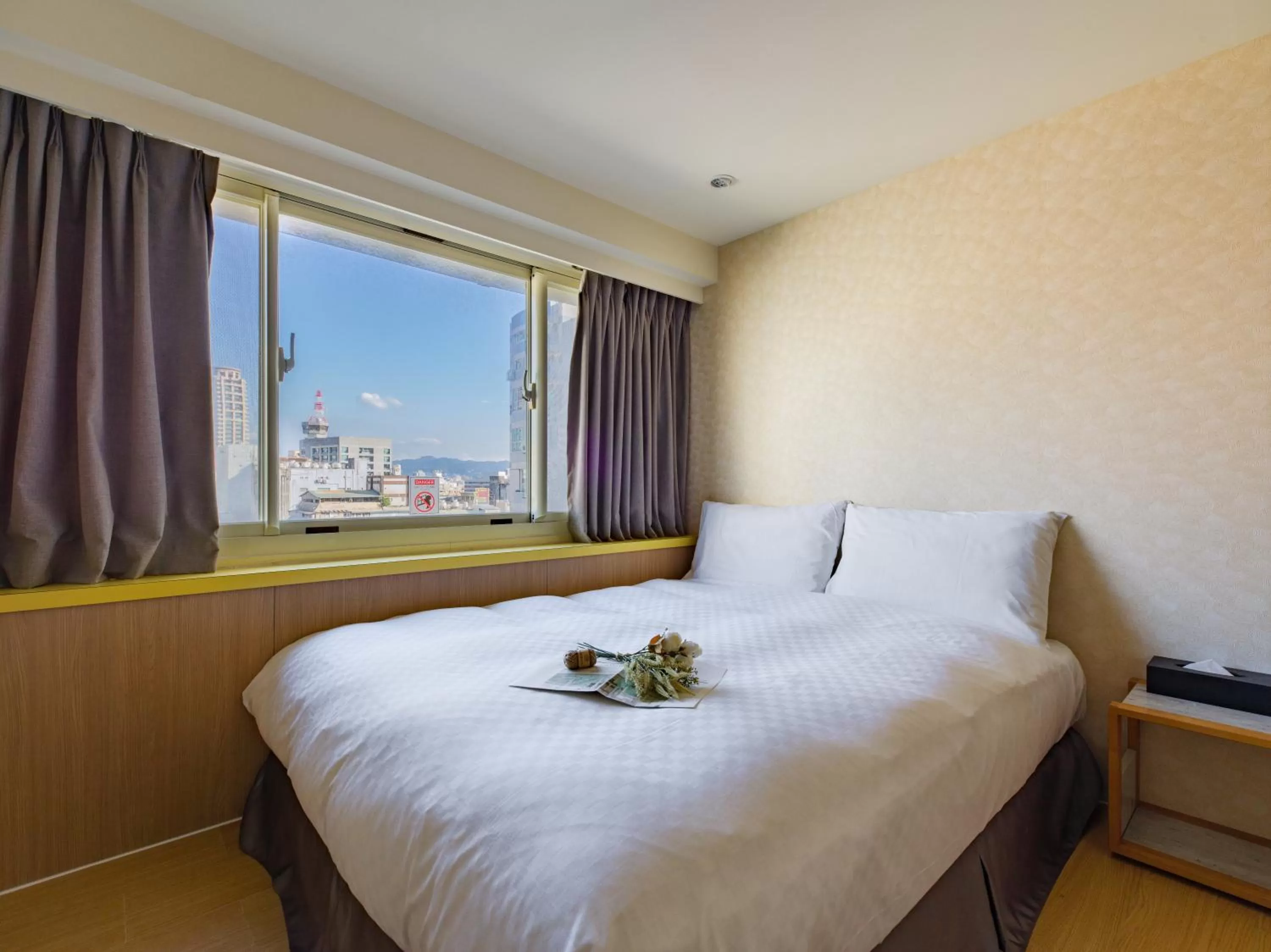 Bed in Ximenhotel-Xining西門大飯店-西寧館