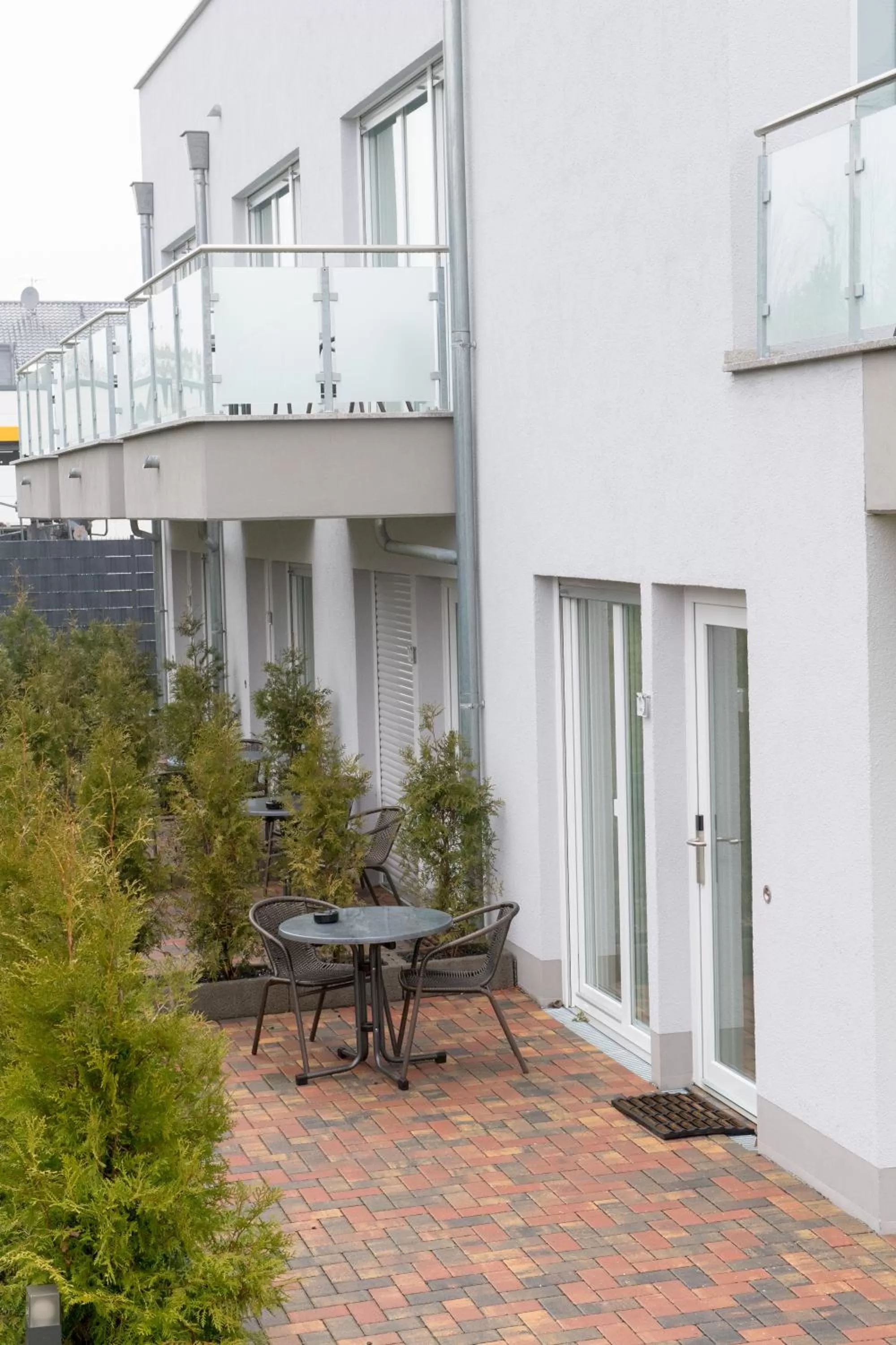 Garden, Property Building in GLEUEL INN - digital hotel & serviced apartments & boardinghouse mit voll ausgestatteten Küchen