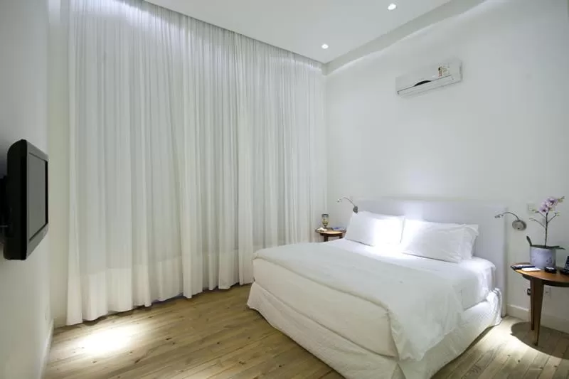 Bed in Felissimo Exclusive Hotel