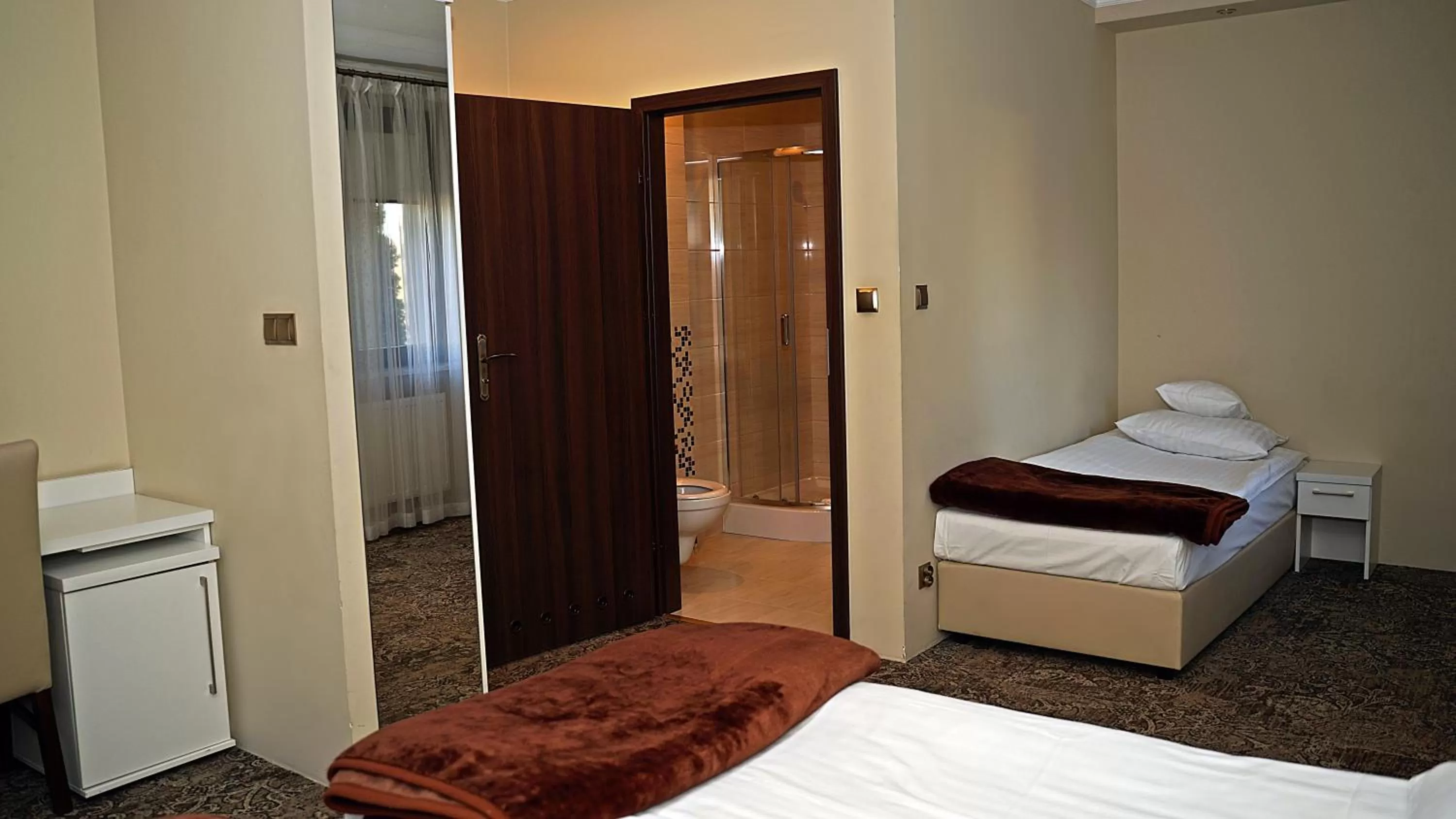 Bed in Hotel Promien