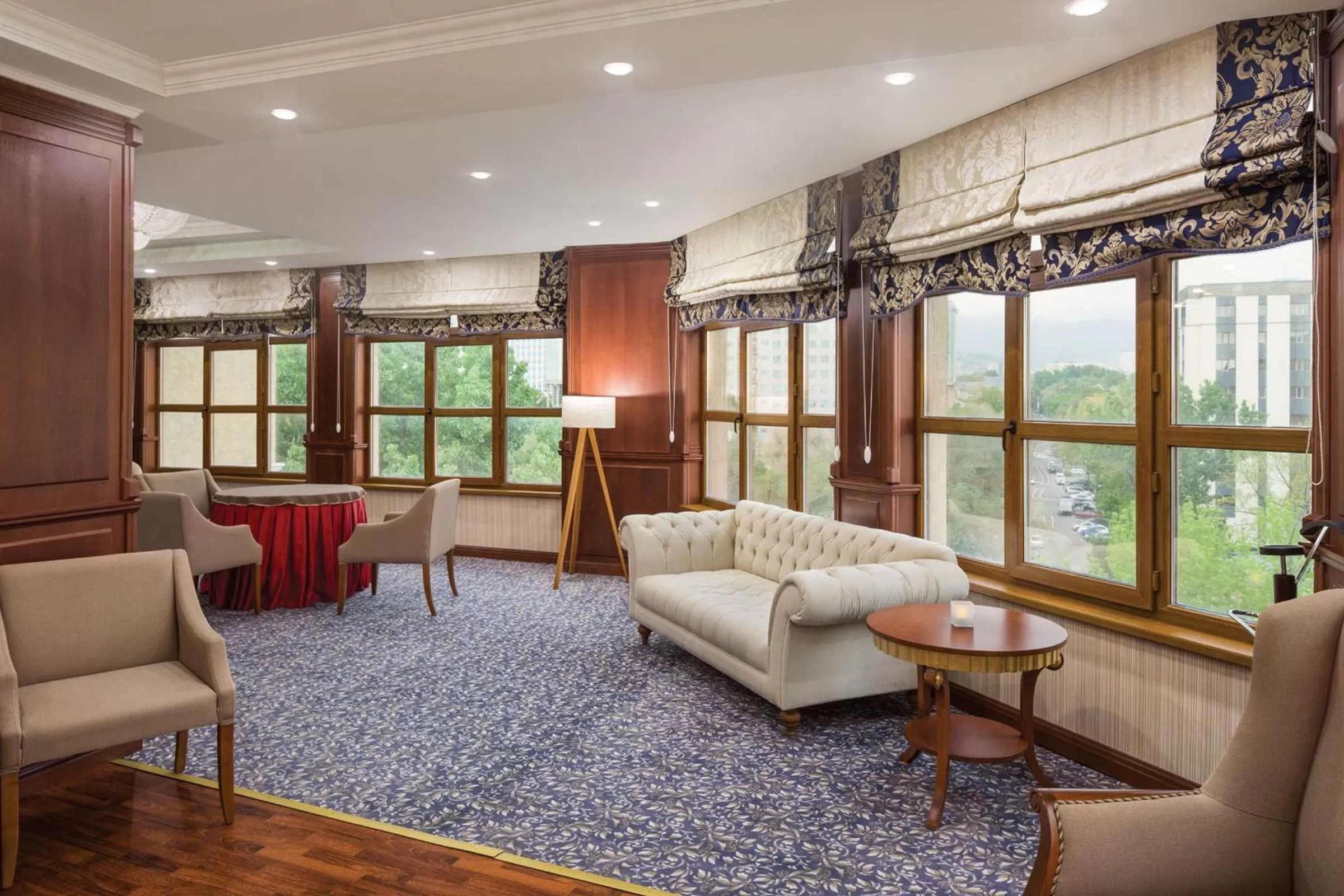 Communal lounge/ TV room in Ramada by Wyndham Almaty