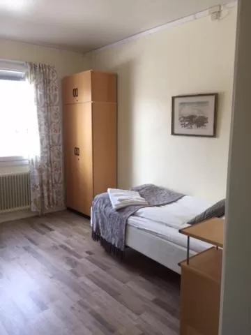 Photo of the whole room, Bed in STF Malmfältens Folkhögskola