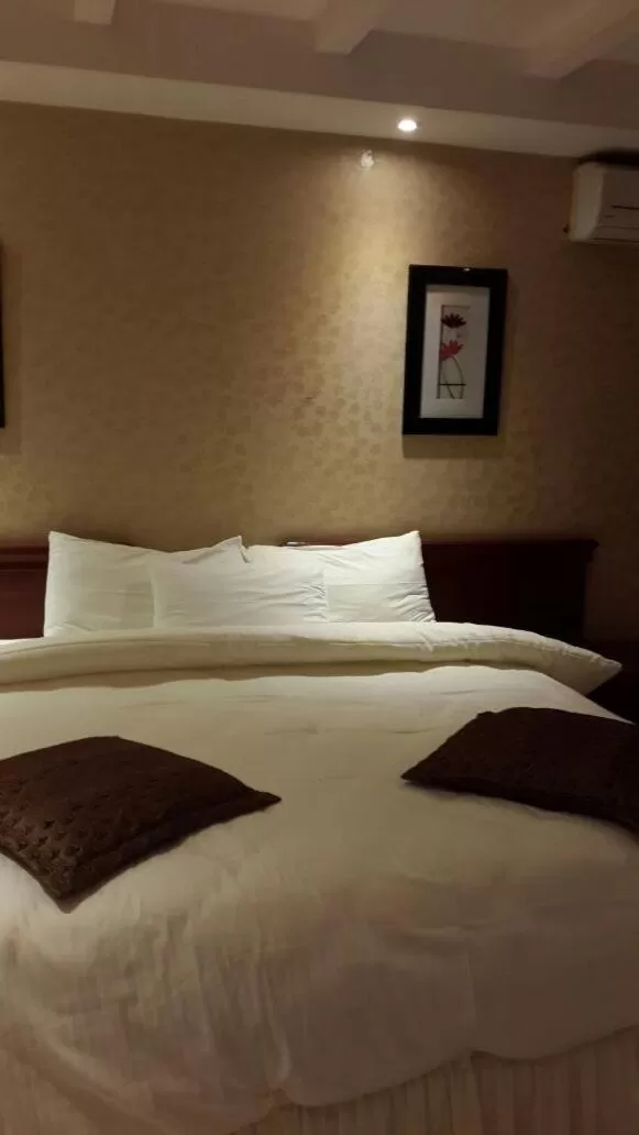 Bedroom, Bed in Almeswari Suites