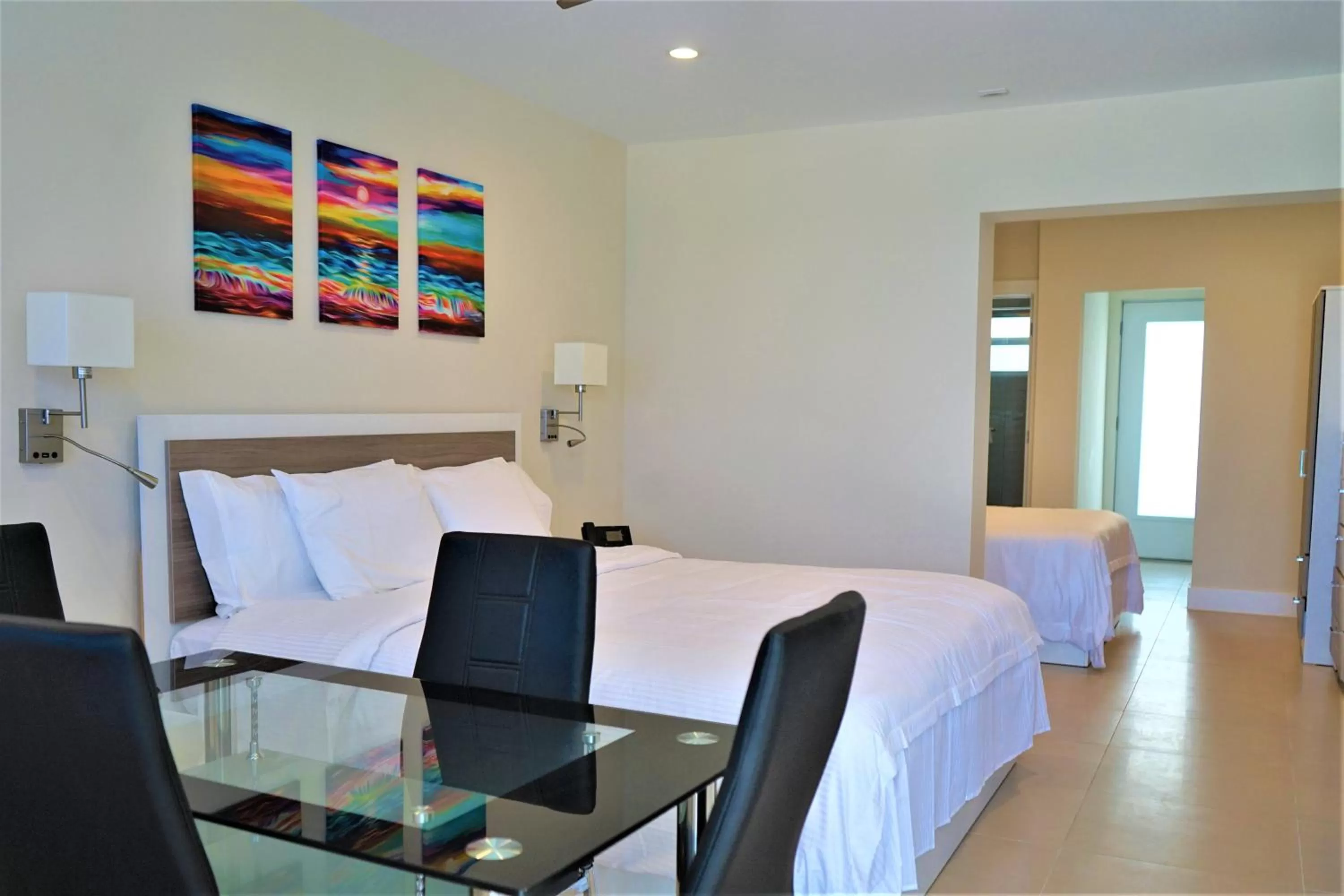 Living room, Bed in Diane Oceanfront Suites