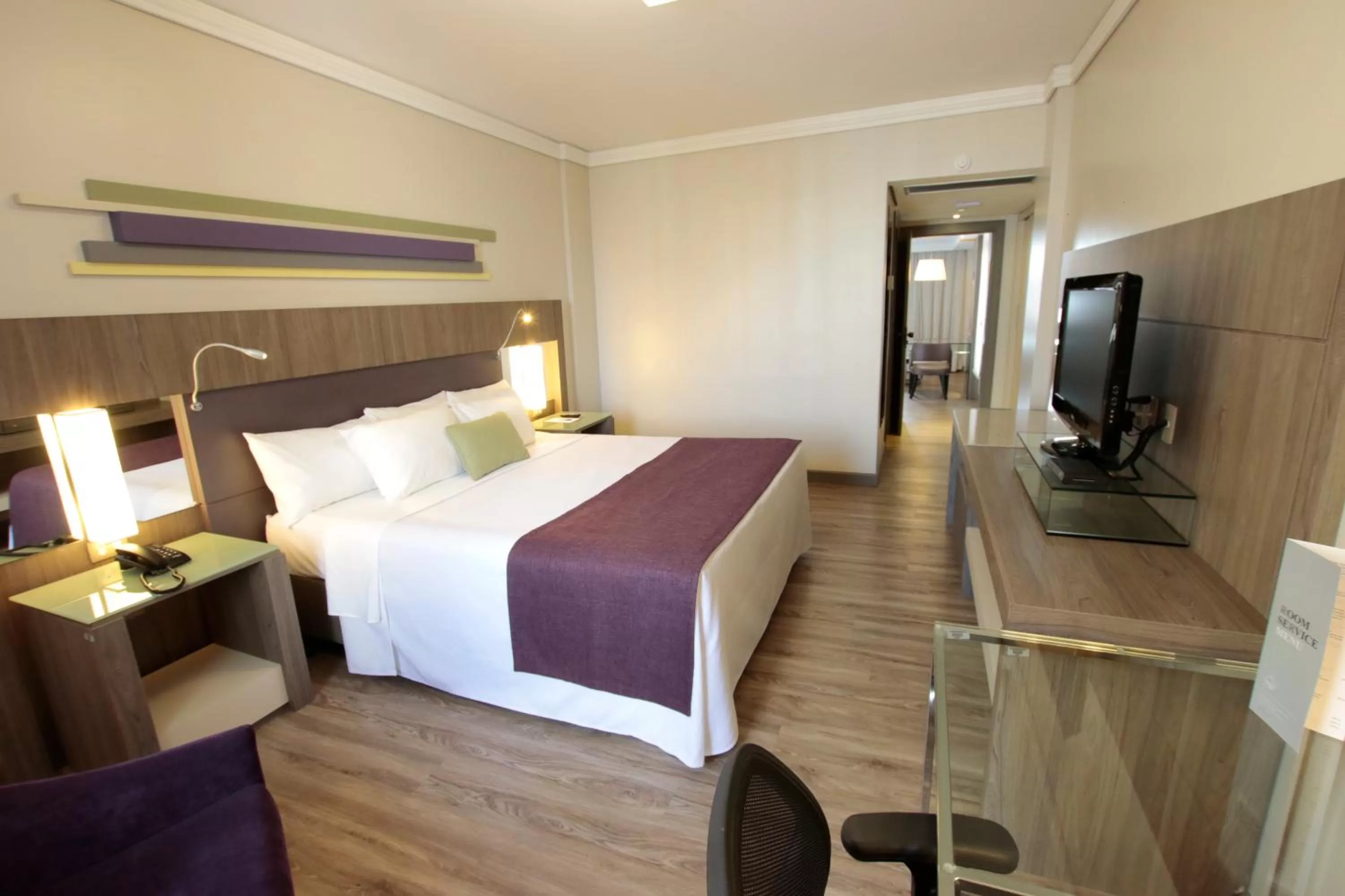 Bed in Grand Mercure Curitiba Rayon