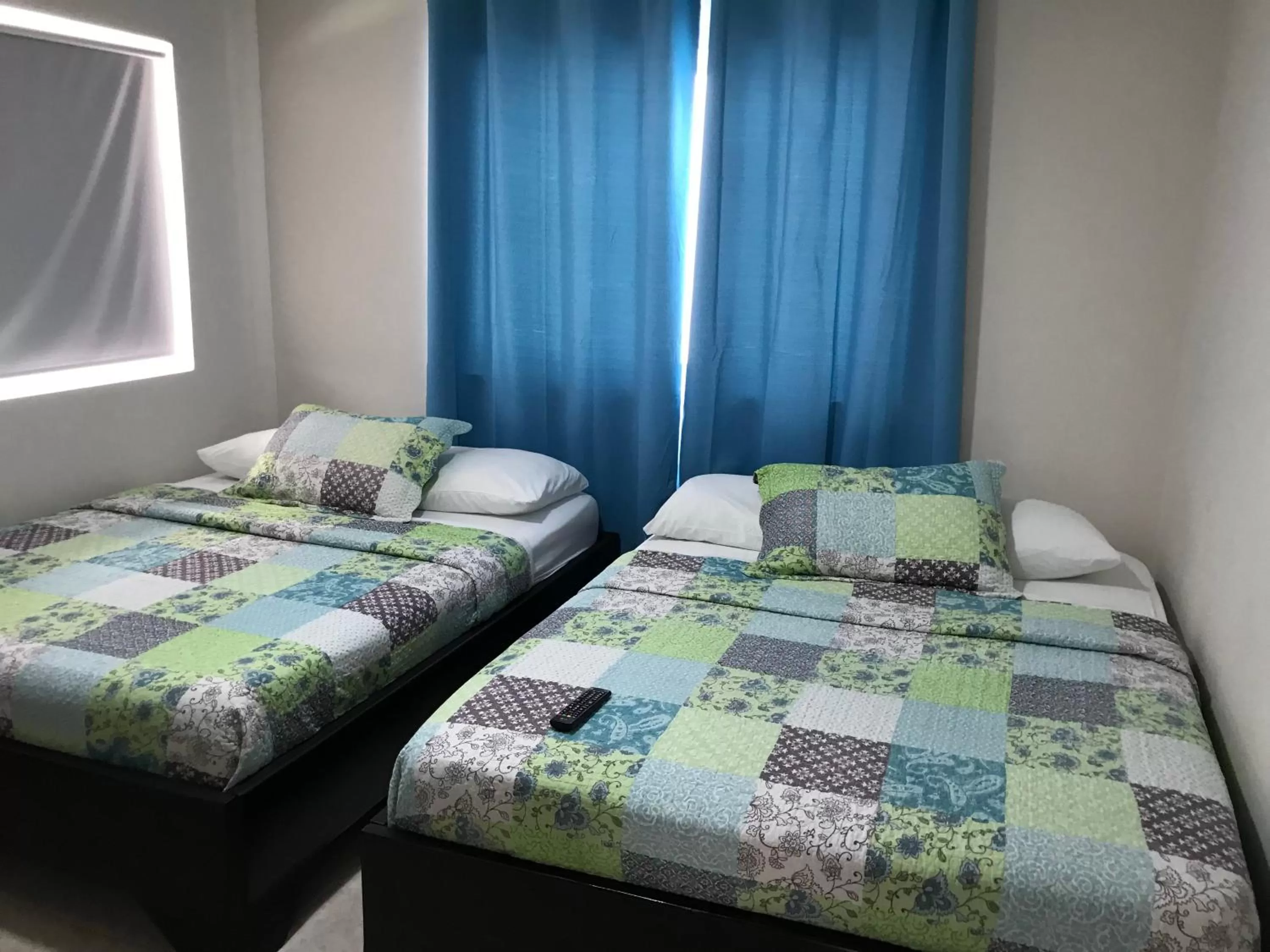 Bed in Caribbean Island Hotel Piso 2