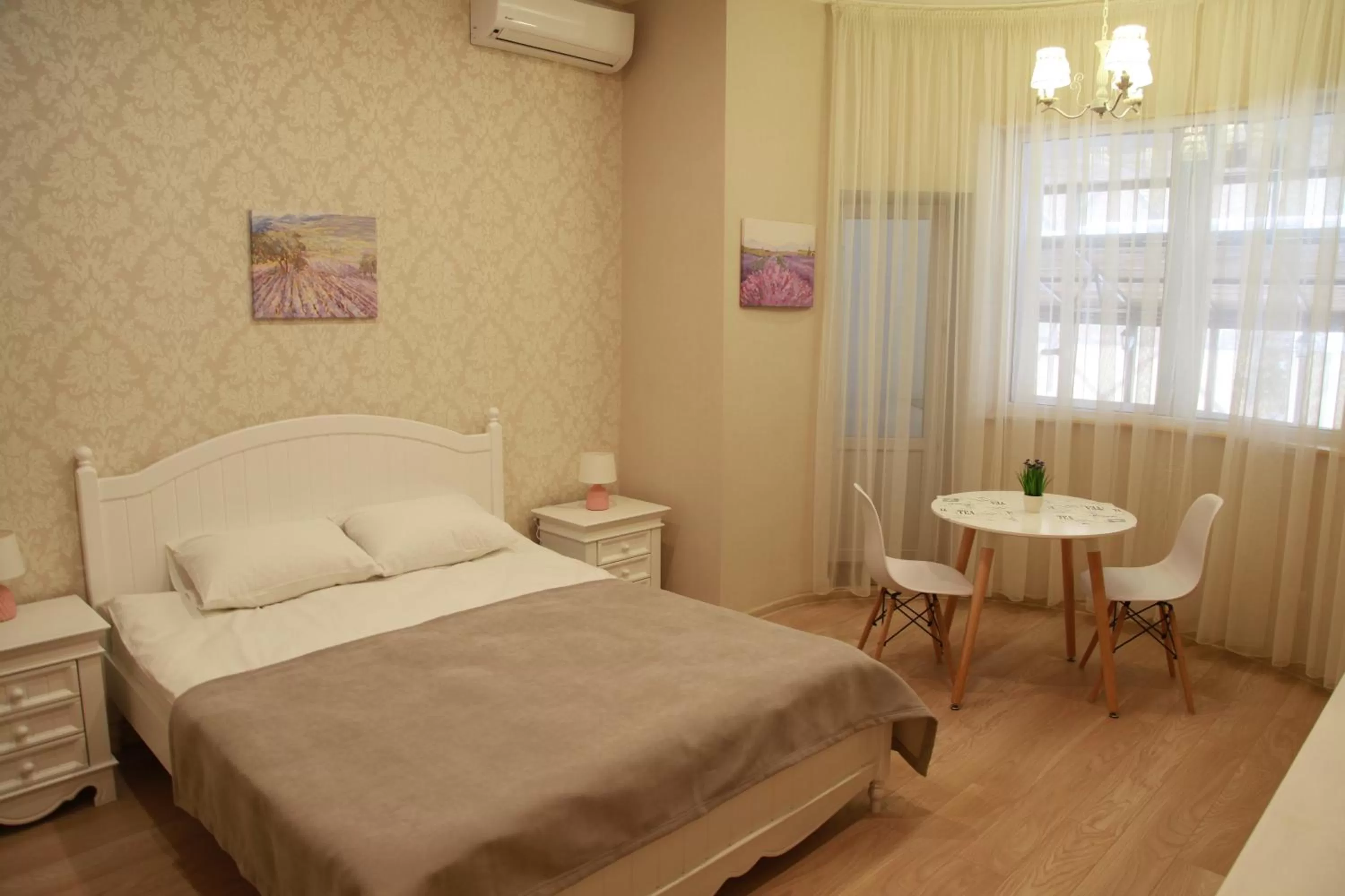 Bed in WINE & ROSE BOUTIQUE HOTEL