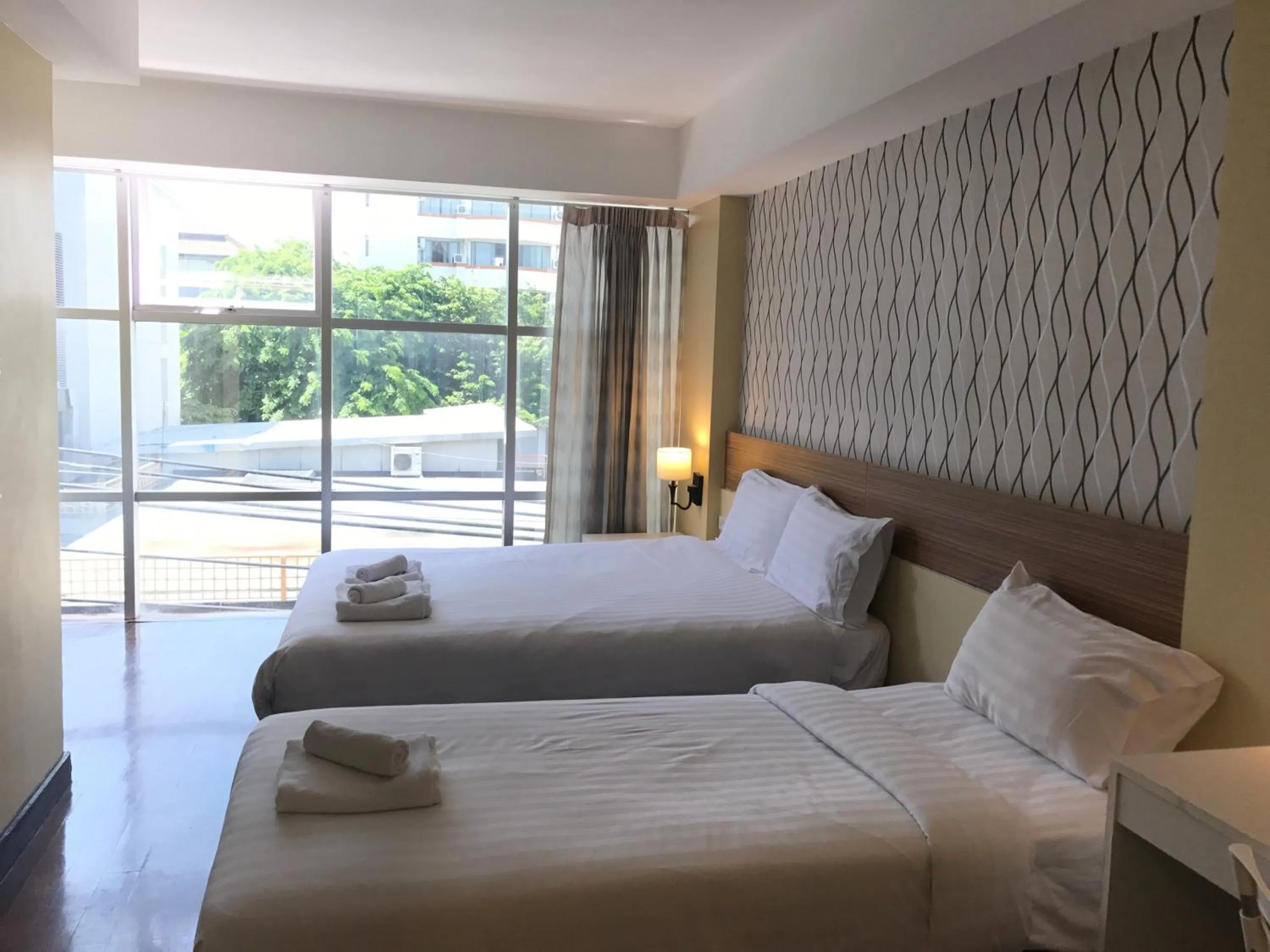 Bed in Snooze Hotel Thonglor Bangkok