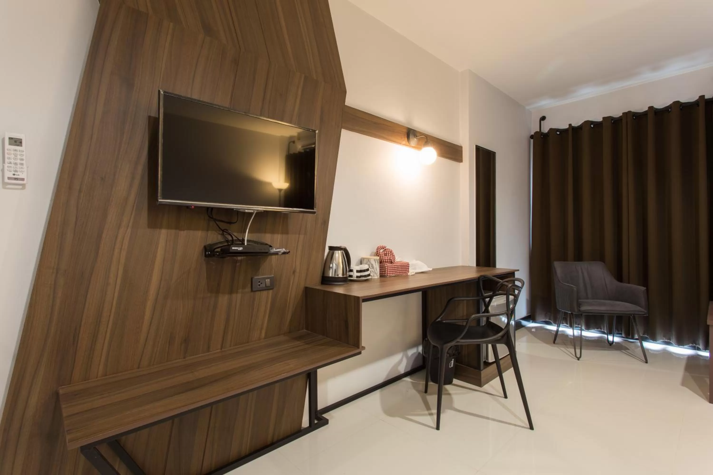 Seating area in Well Timed Hotel