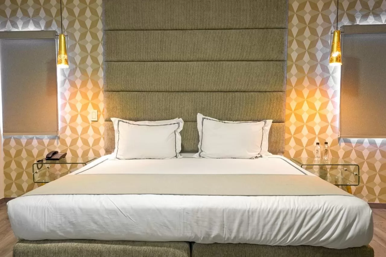 Bed in Hotel Posada San Antonio