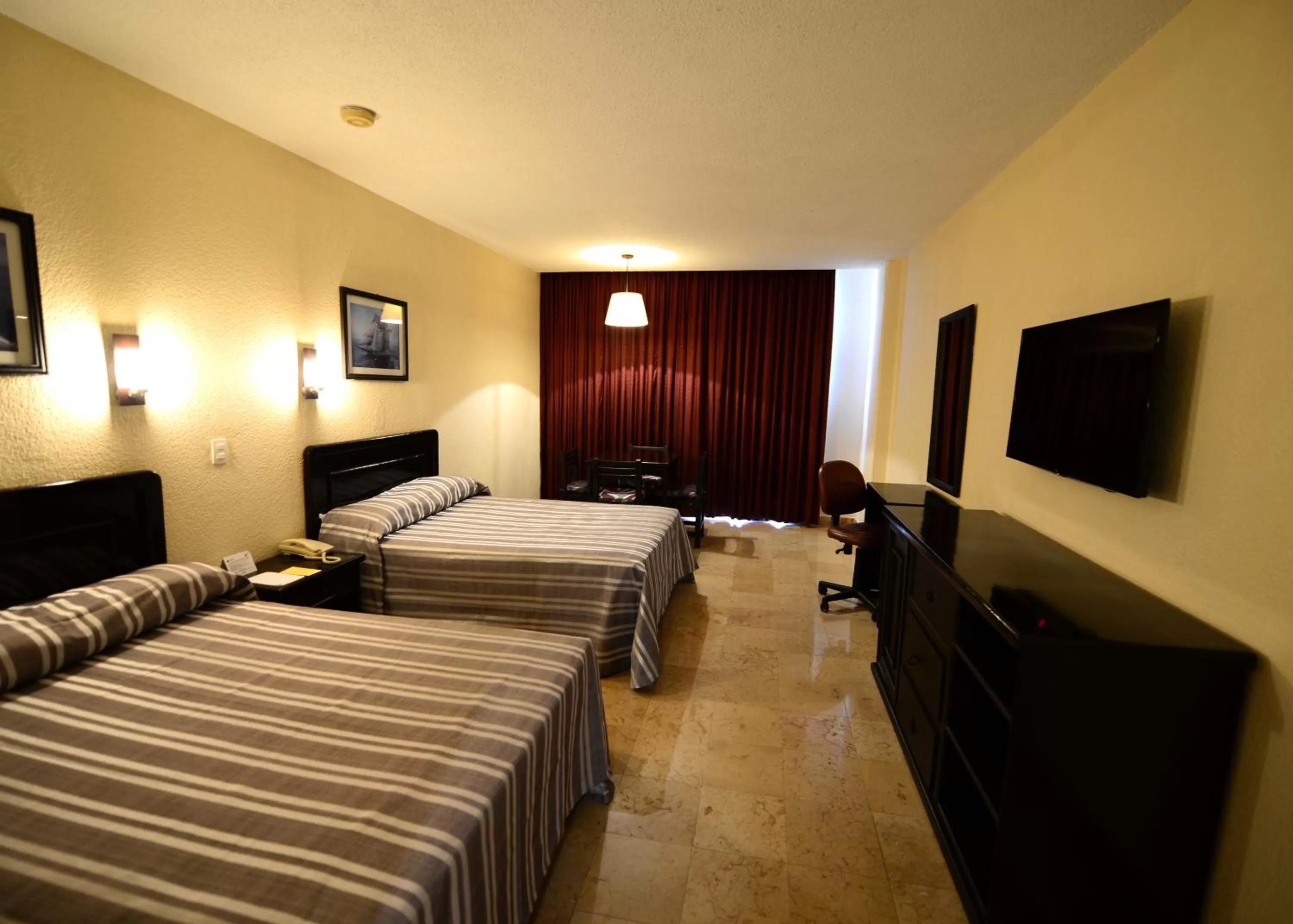 Photo of the whole room, Bed in Amarea Hotel Acapulco