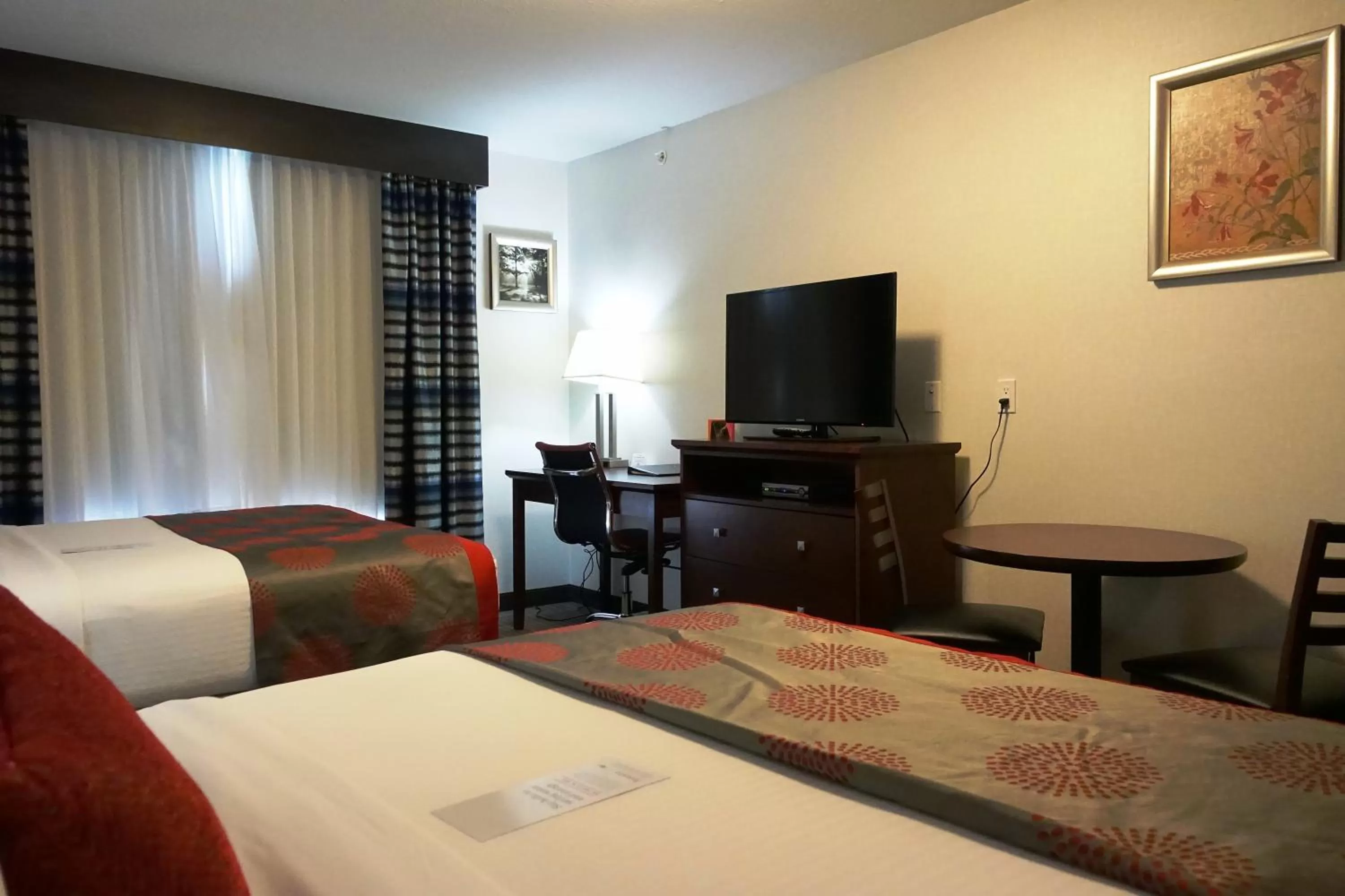 Photo of the whole room, Bed in Ramada by Wyndham Moose Jaw