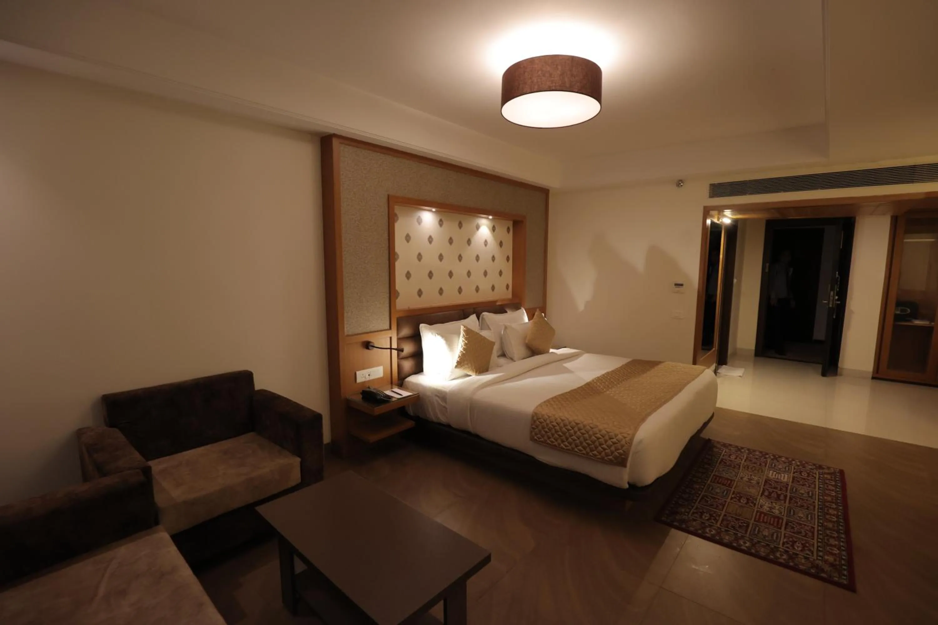 Bedroom, Bed in Clarion Inn Indore