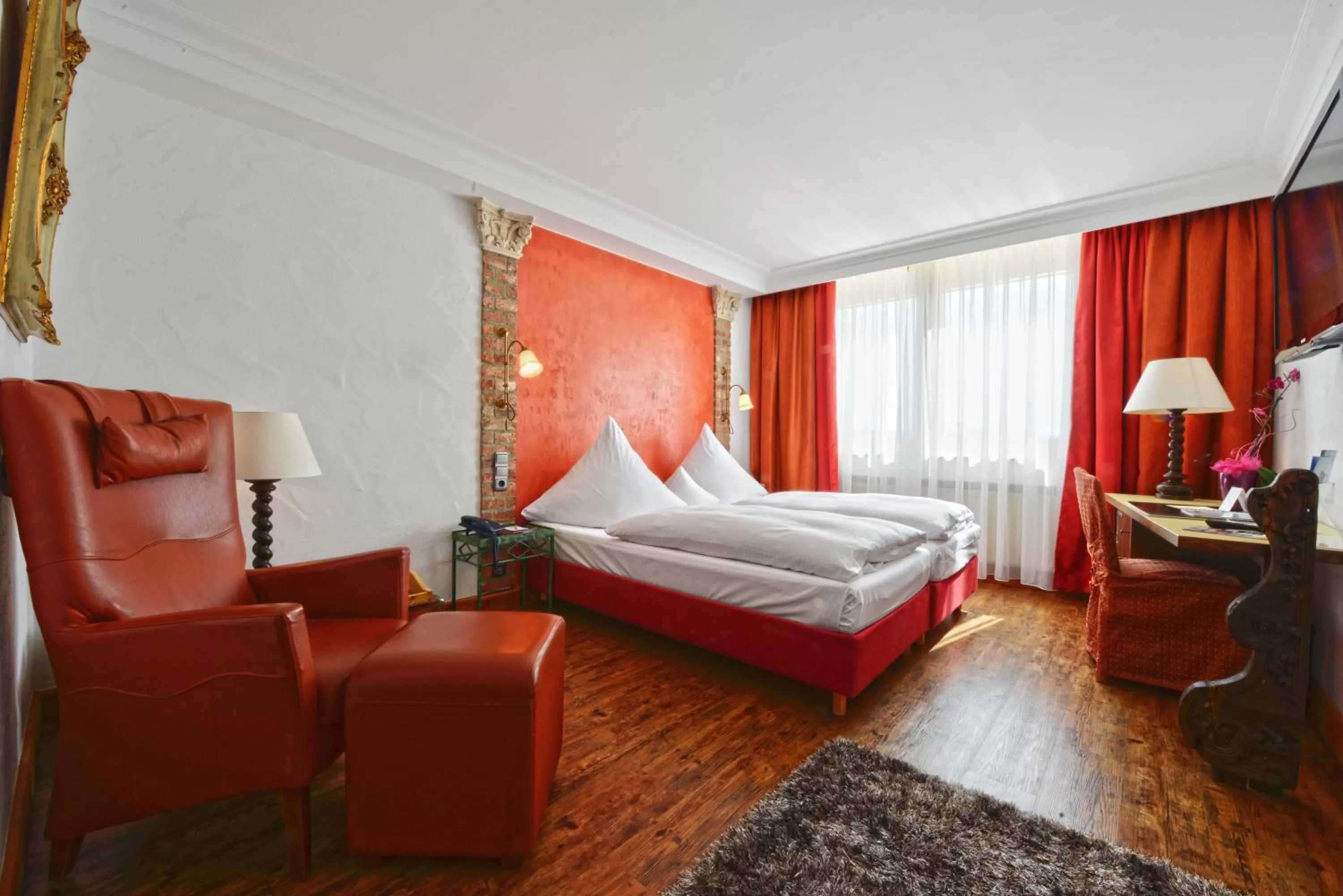 Photo of the whole room, Bed in Ringhotel Alpenhof - Patchworkhotel