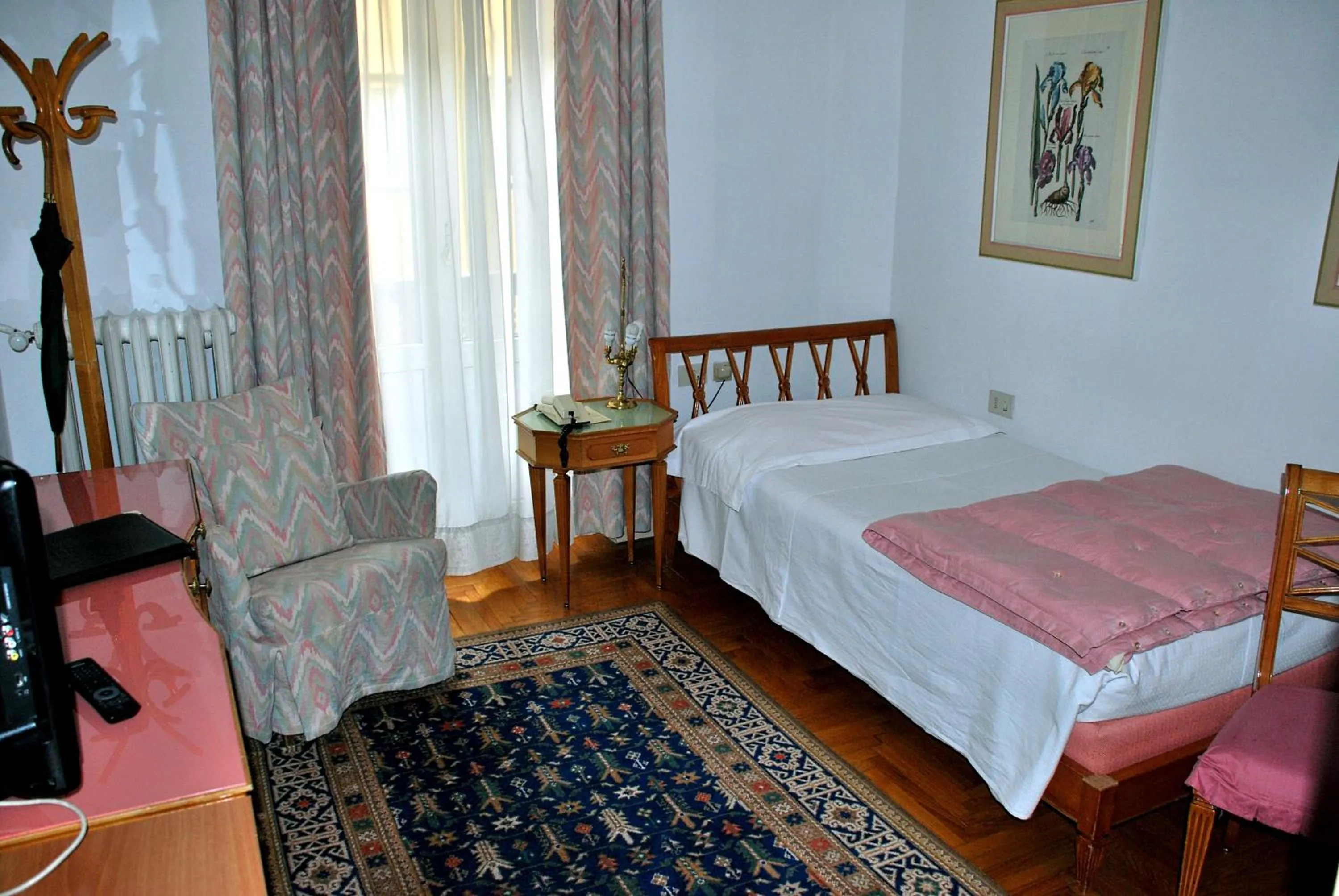 Bed in Hotel De La Poste