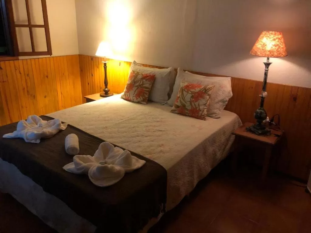 Bed in POUSADA CHARLOTTE