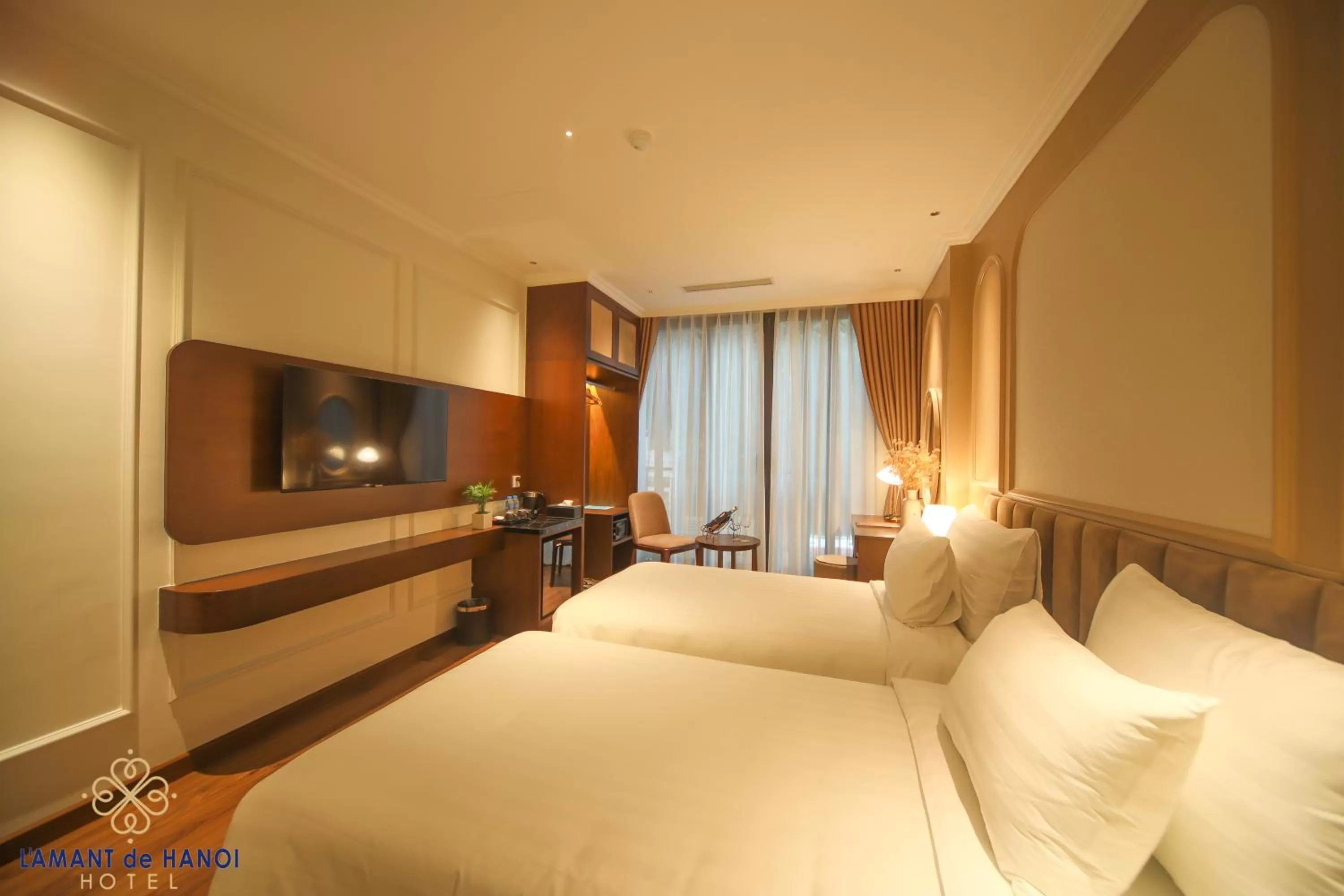 Bed in L'amant de Hanoi Hotel - khách sạn Lamant de Hà Nội