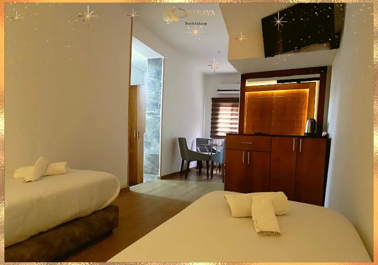 Bed in Assaraya Palace Hotel