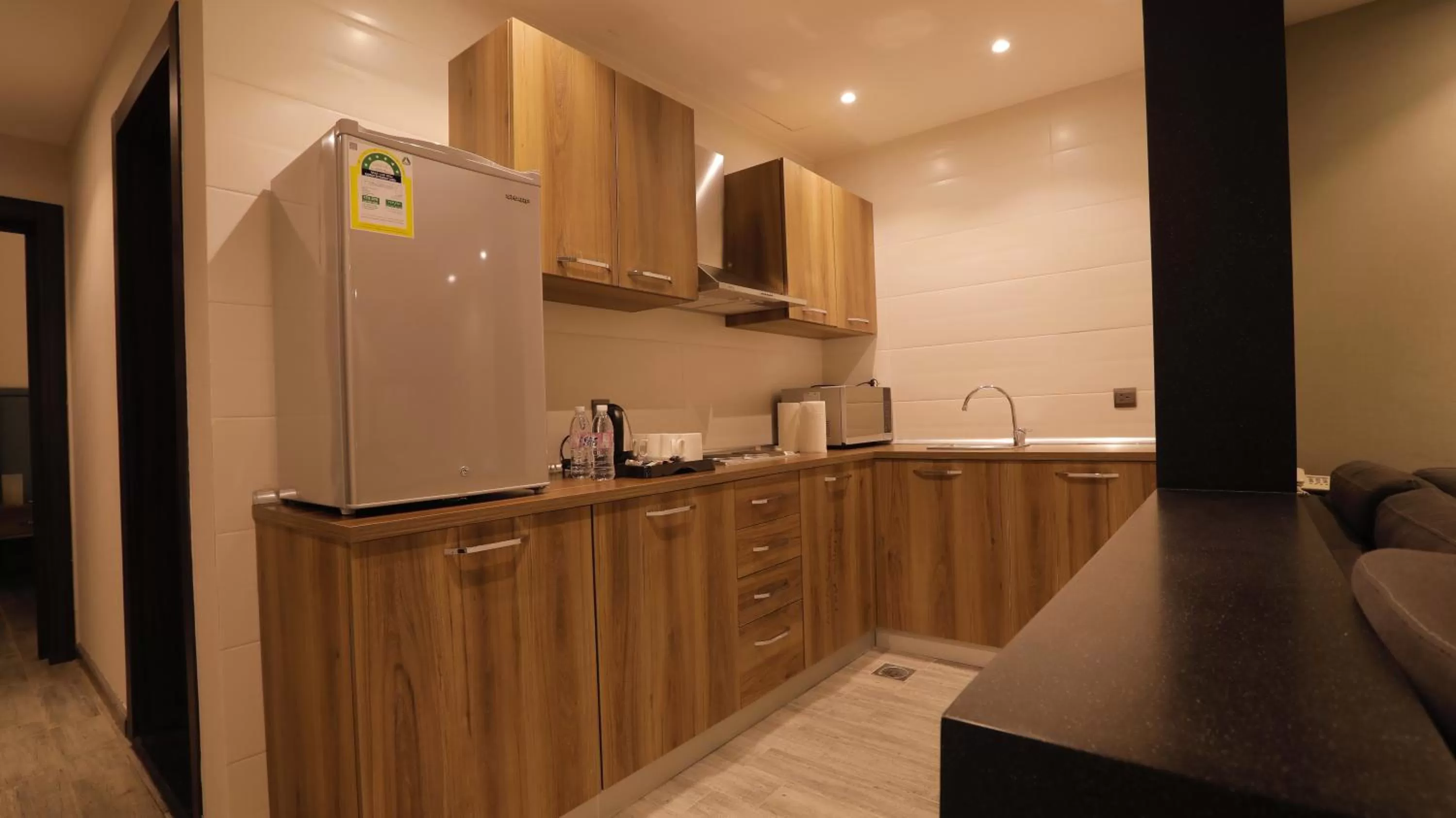 Communal kitchen, Kitchen/Kitchenette in Stay Inn Suites