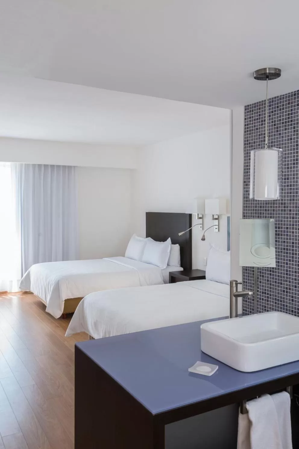 Photo of the whole room, Bed in Fiesta Inn Queretaro