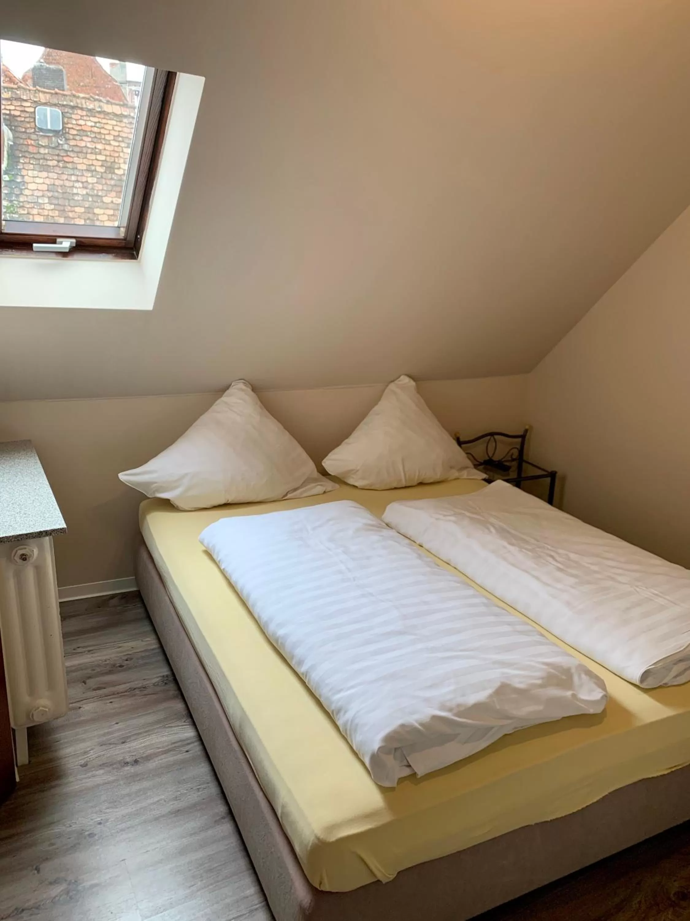 Bed in Gästehaus Präsenzhof