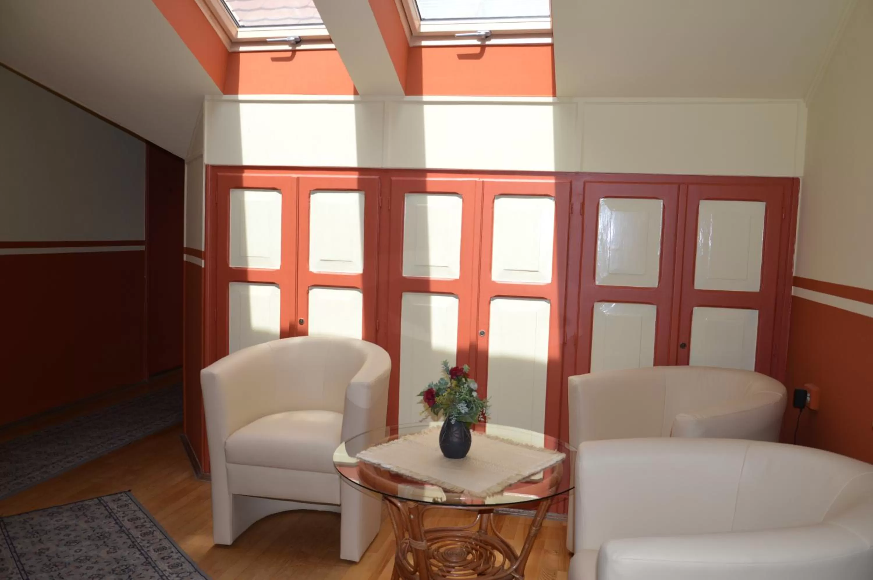 Communal lounge/ TV room in Duna Panzió