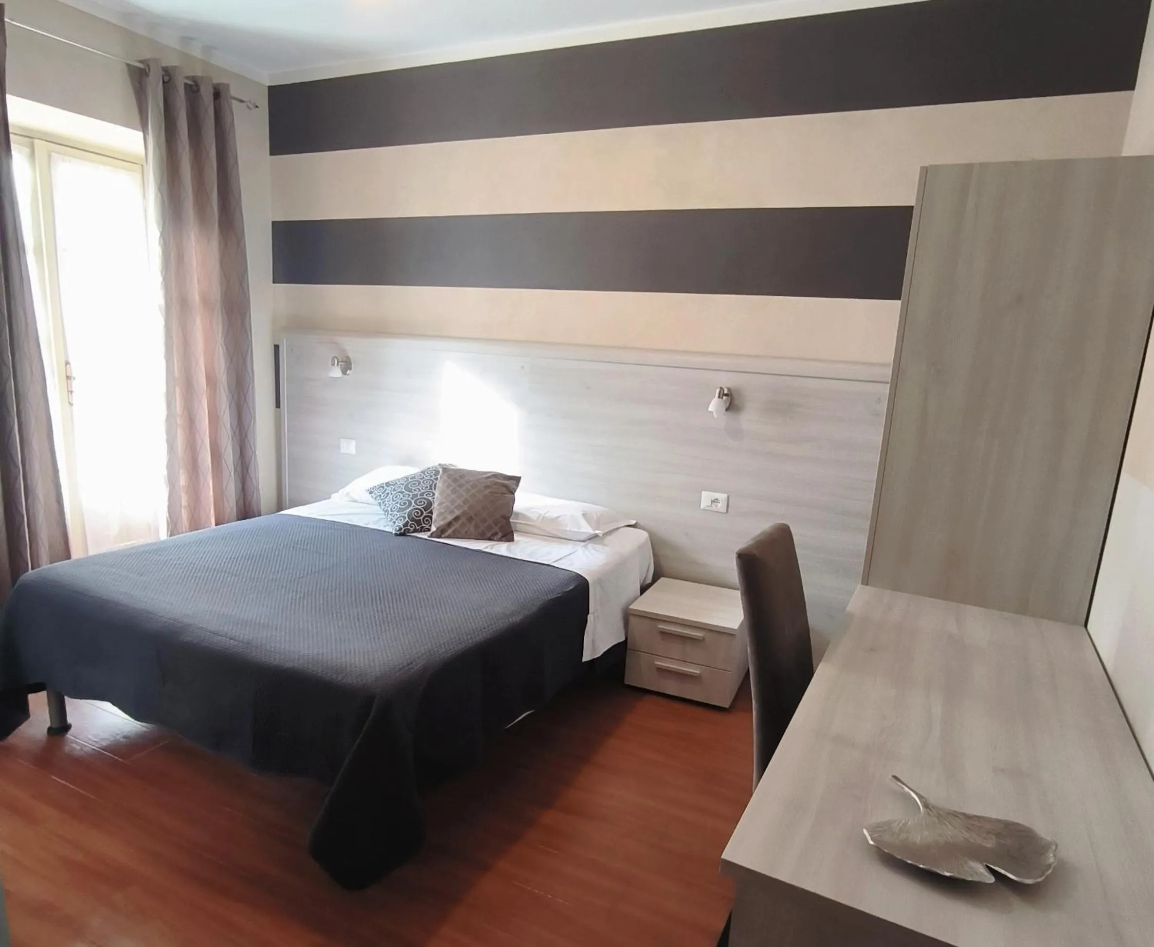 Photo of the whole room, Bed in Hotel Giardini