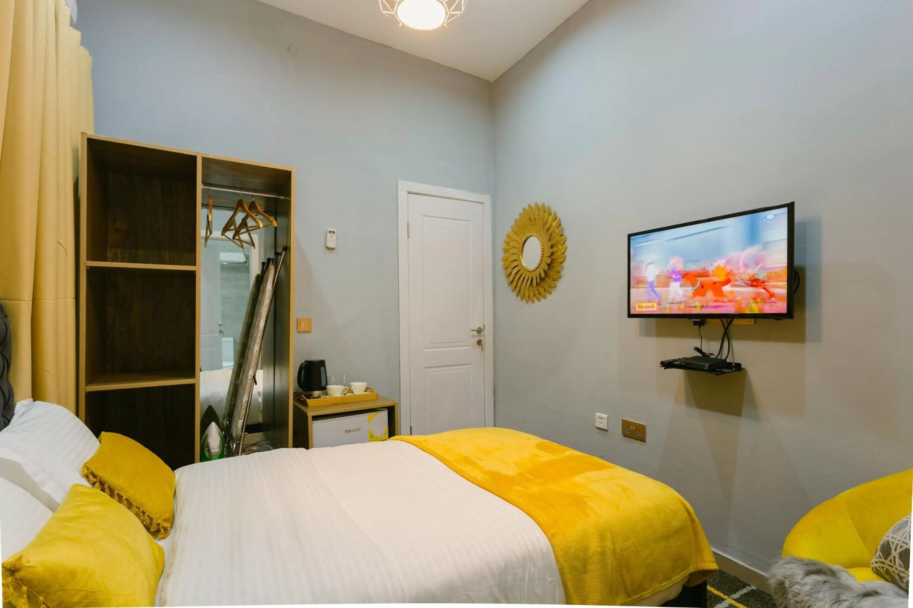 Bed in The Avery Suites, East Legon