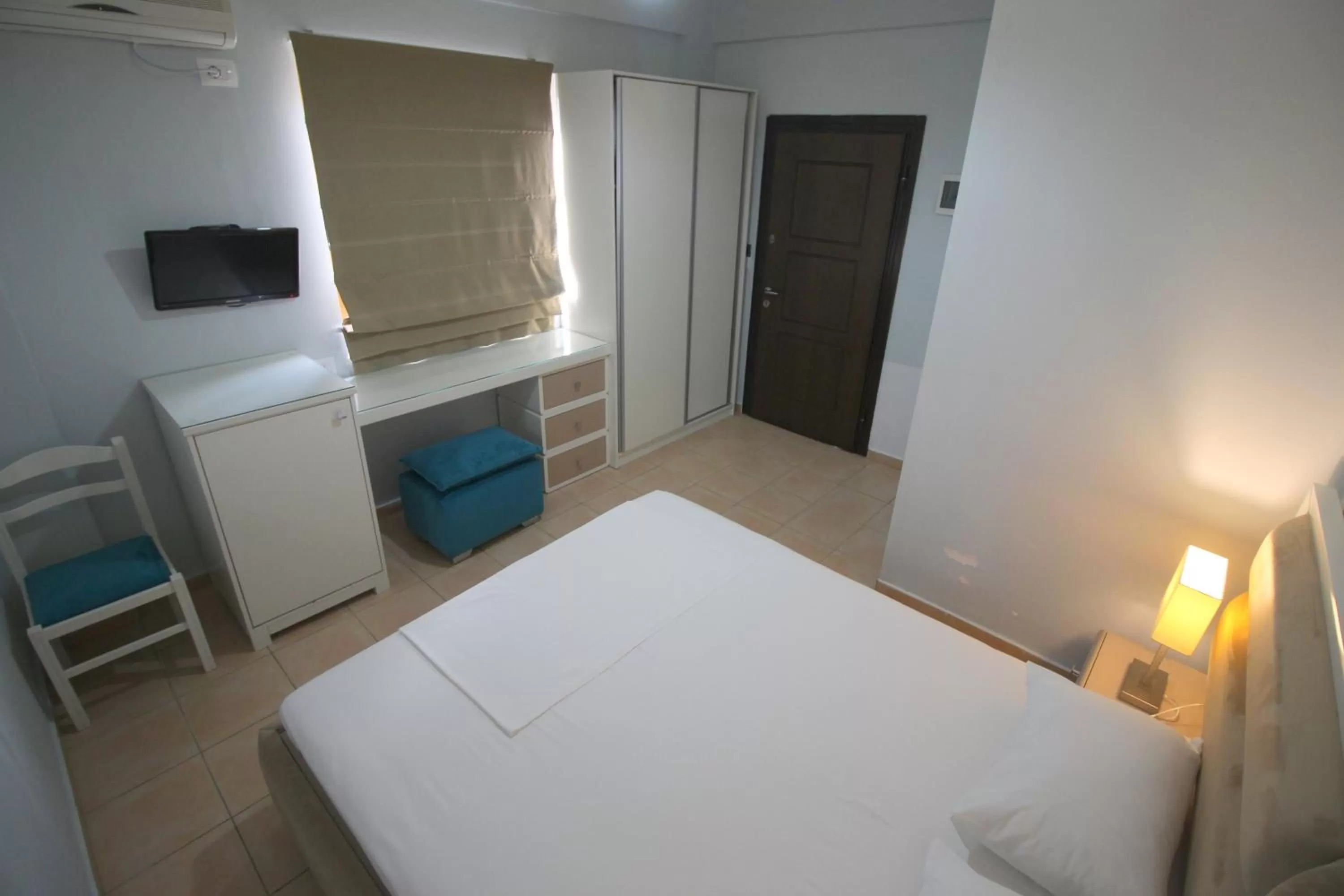 Bed in Murati Suites Sarandë