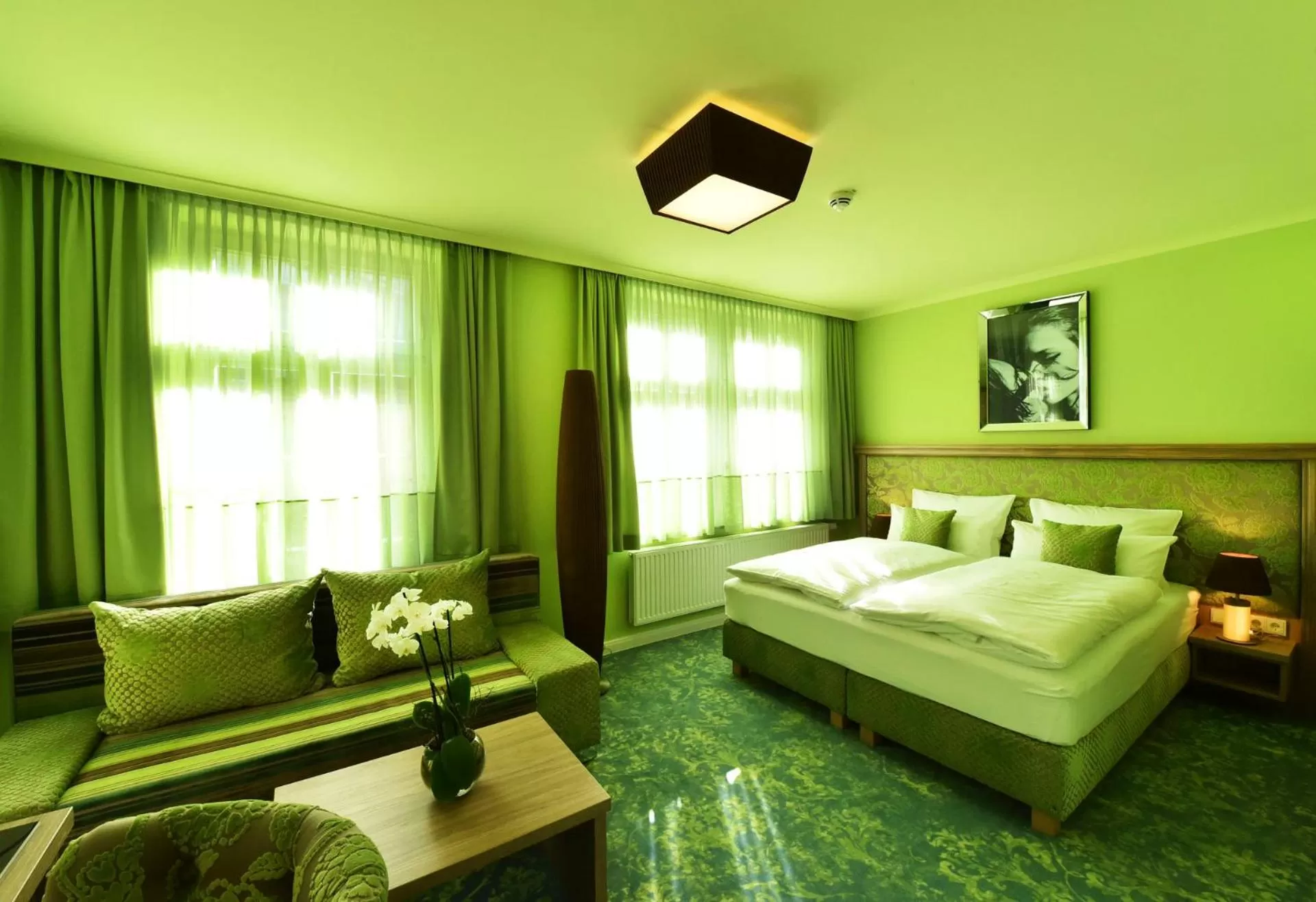 Photo of the whole room, Bed in MOMENTS Boutique Hotel