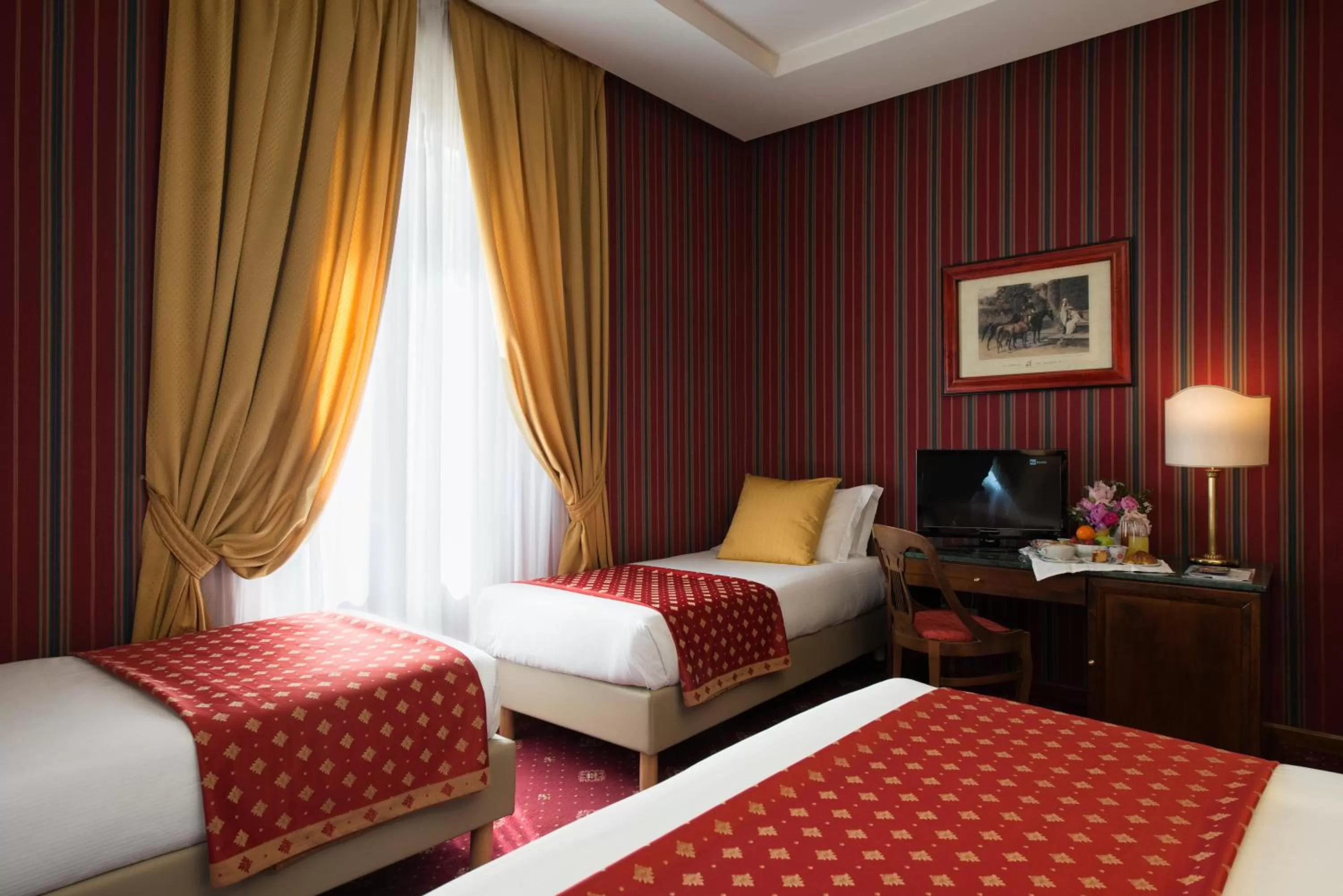 Bed in Atlante Garden Hotel